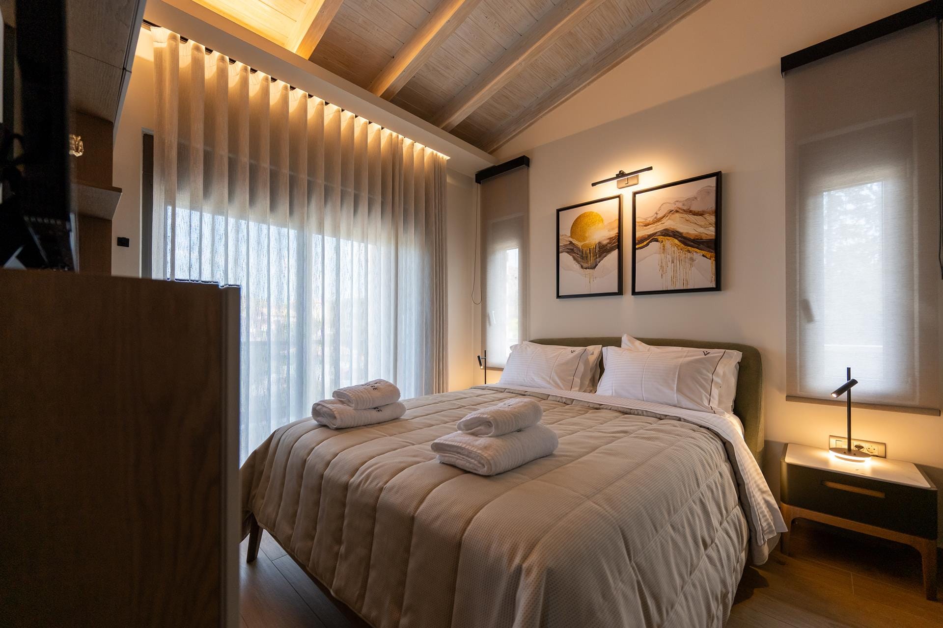 a bed with white sheets