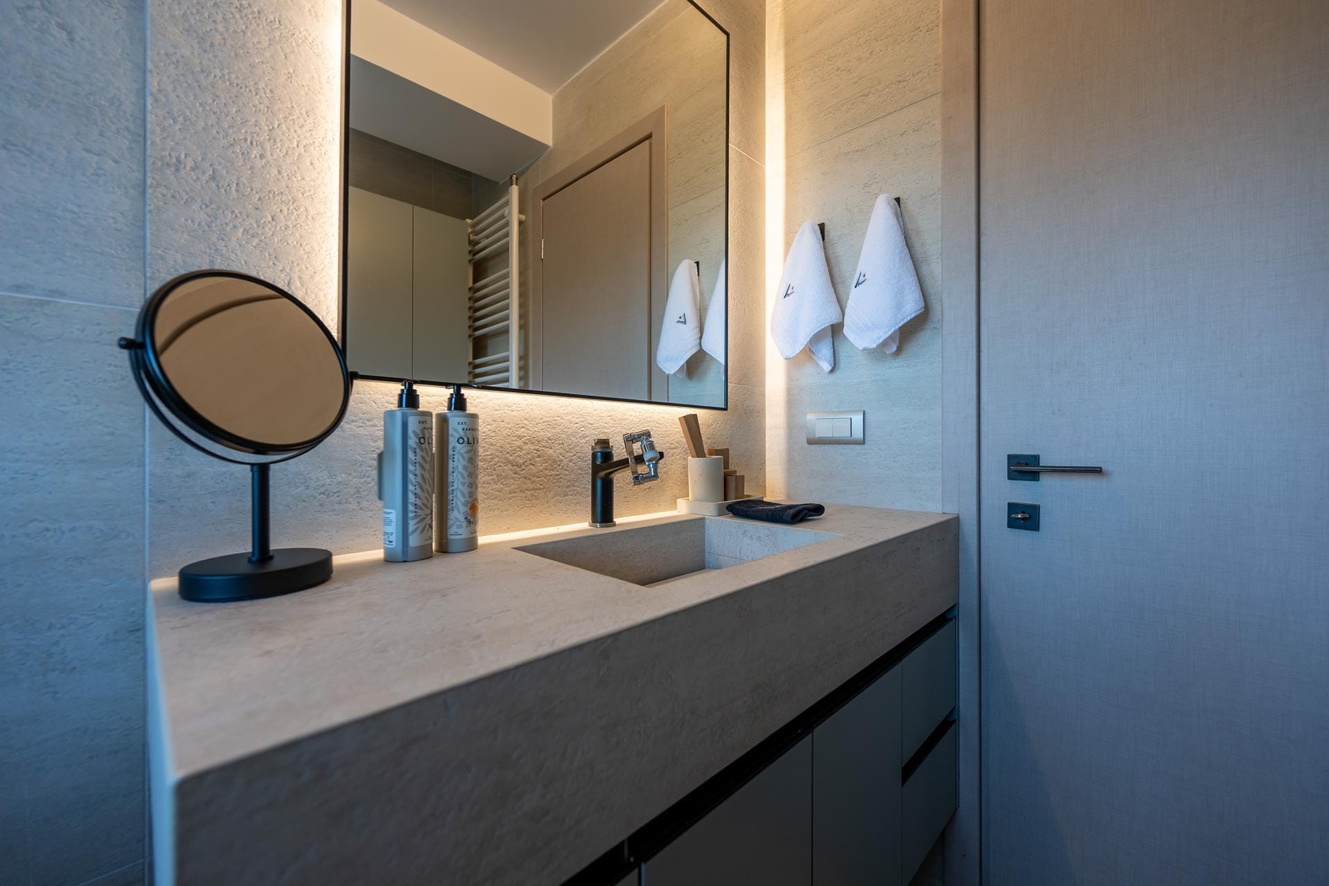 a bathroom with a large mirror