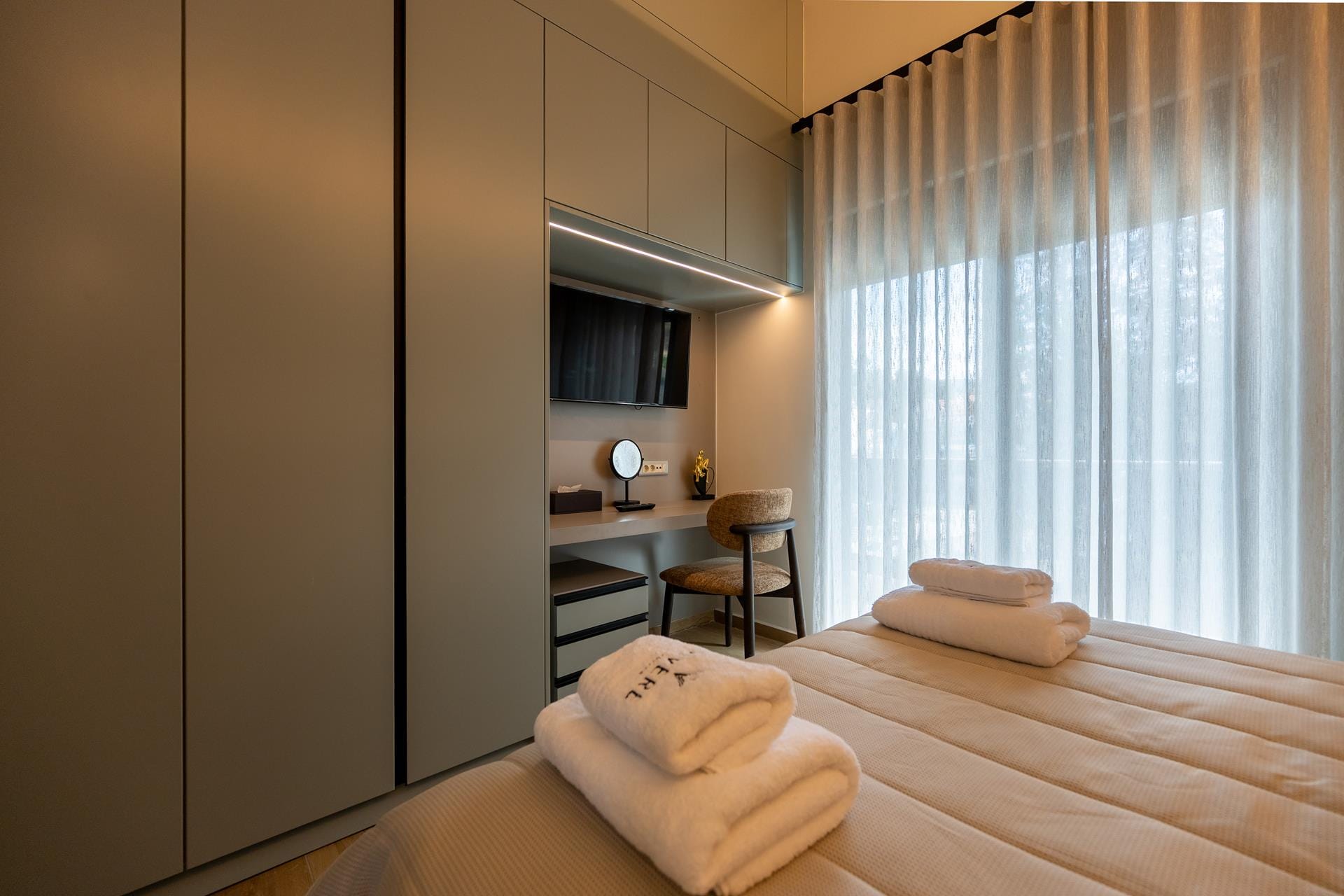 a room with a bed and a table