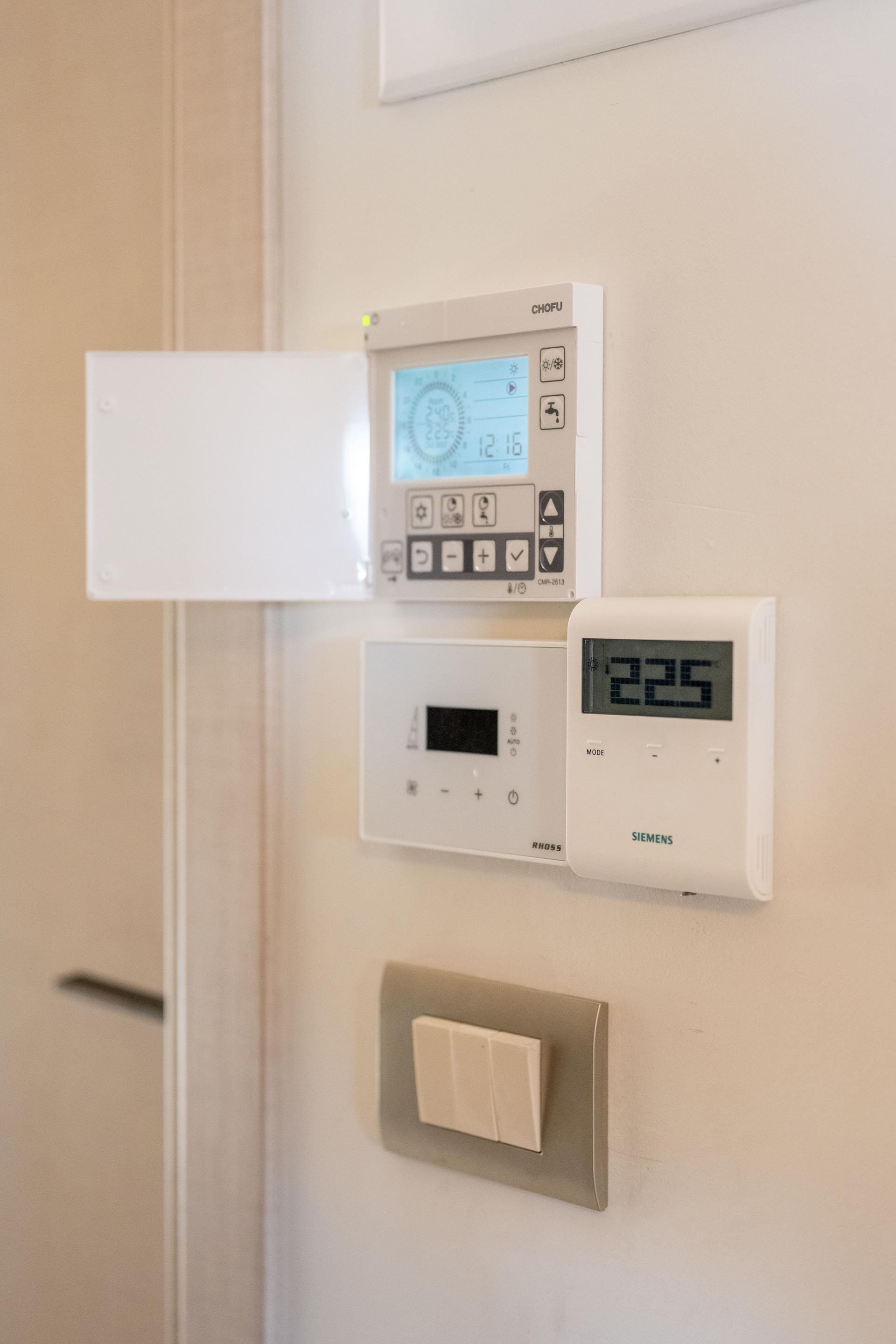 a wall with a few switches