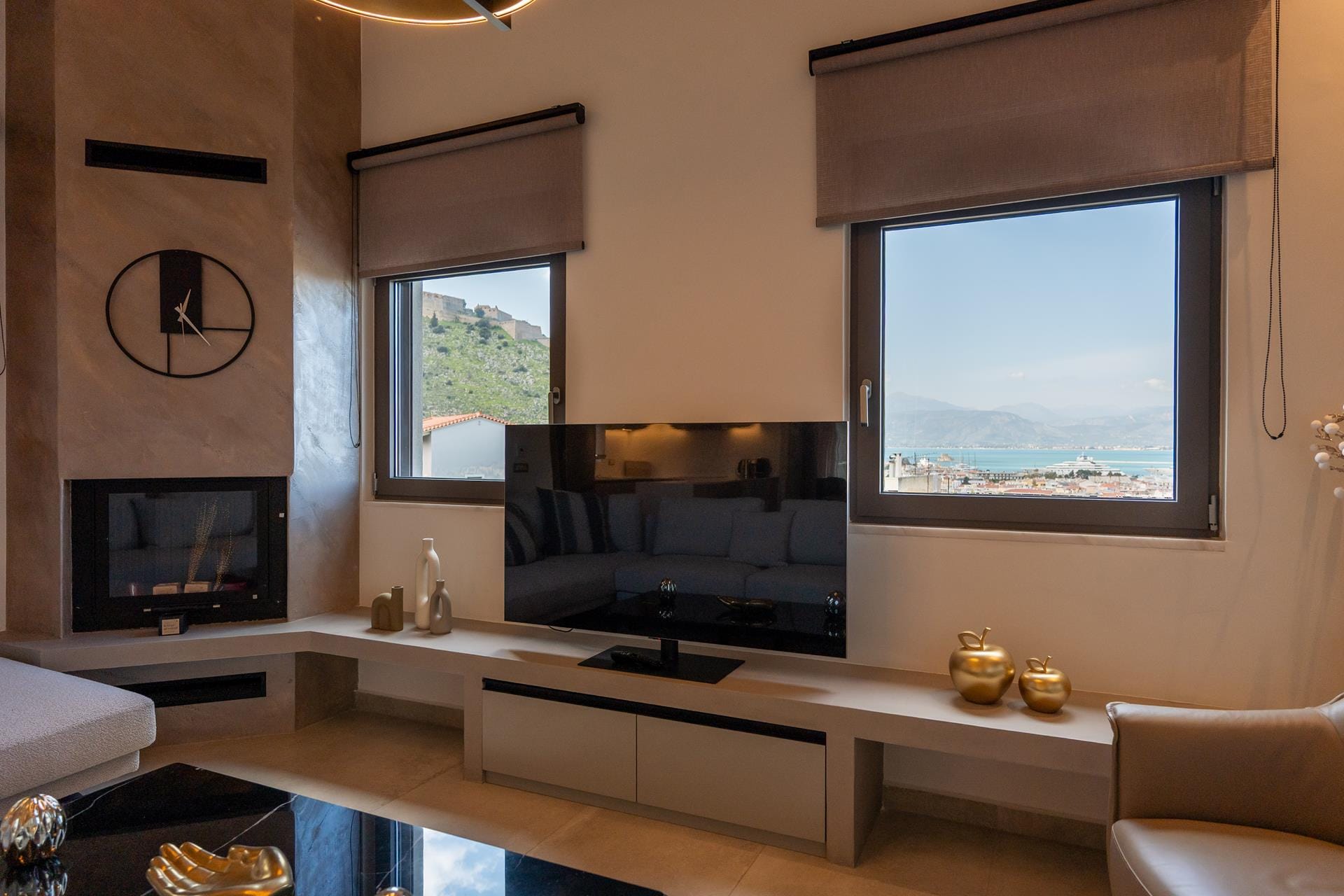 a room with a tv and a couch