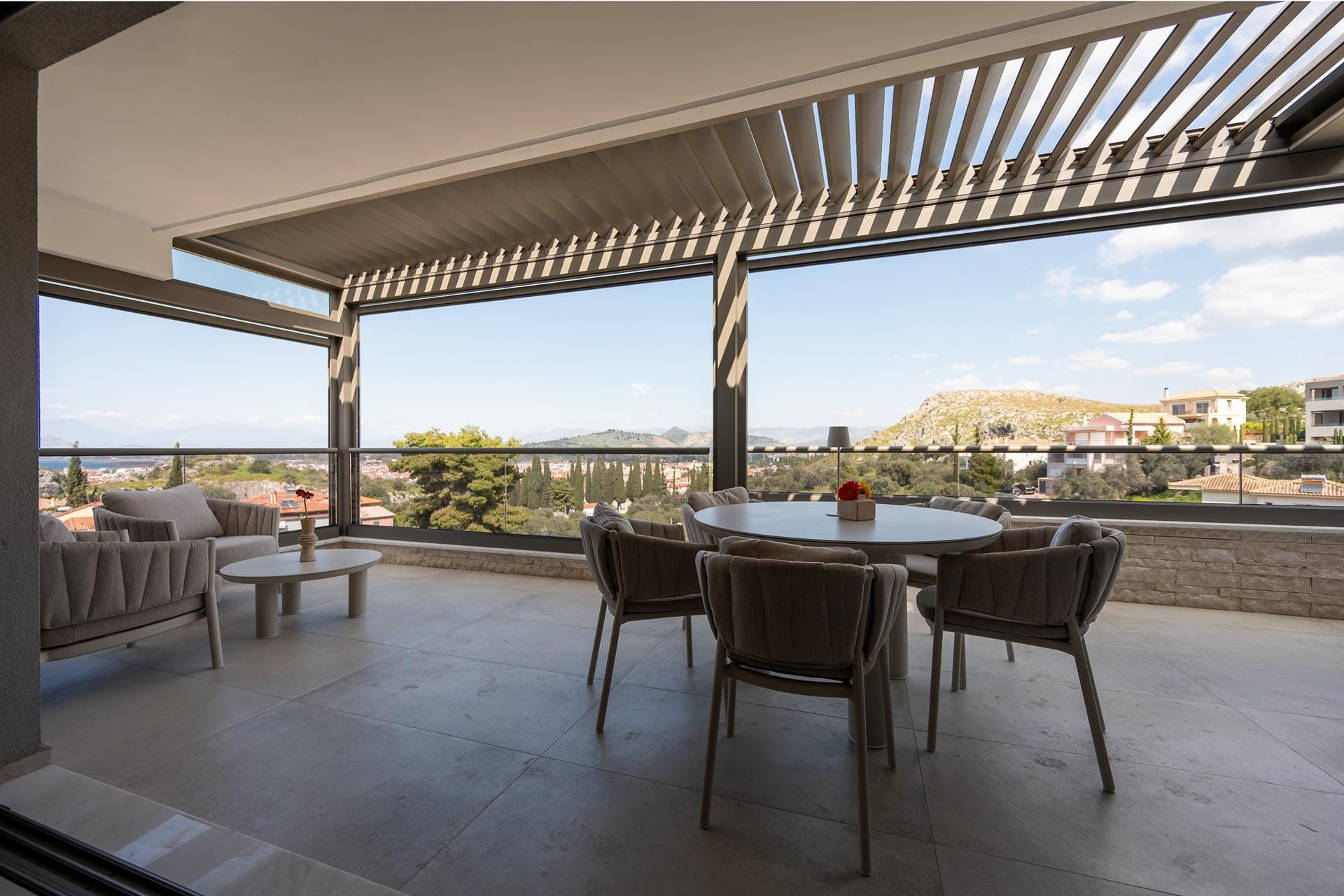 a table and chairs on a deck