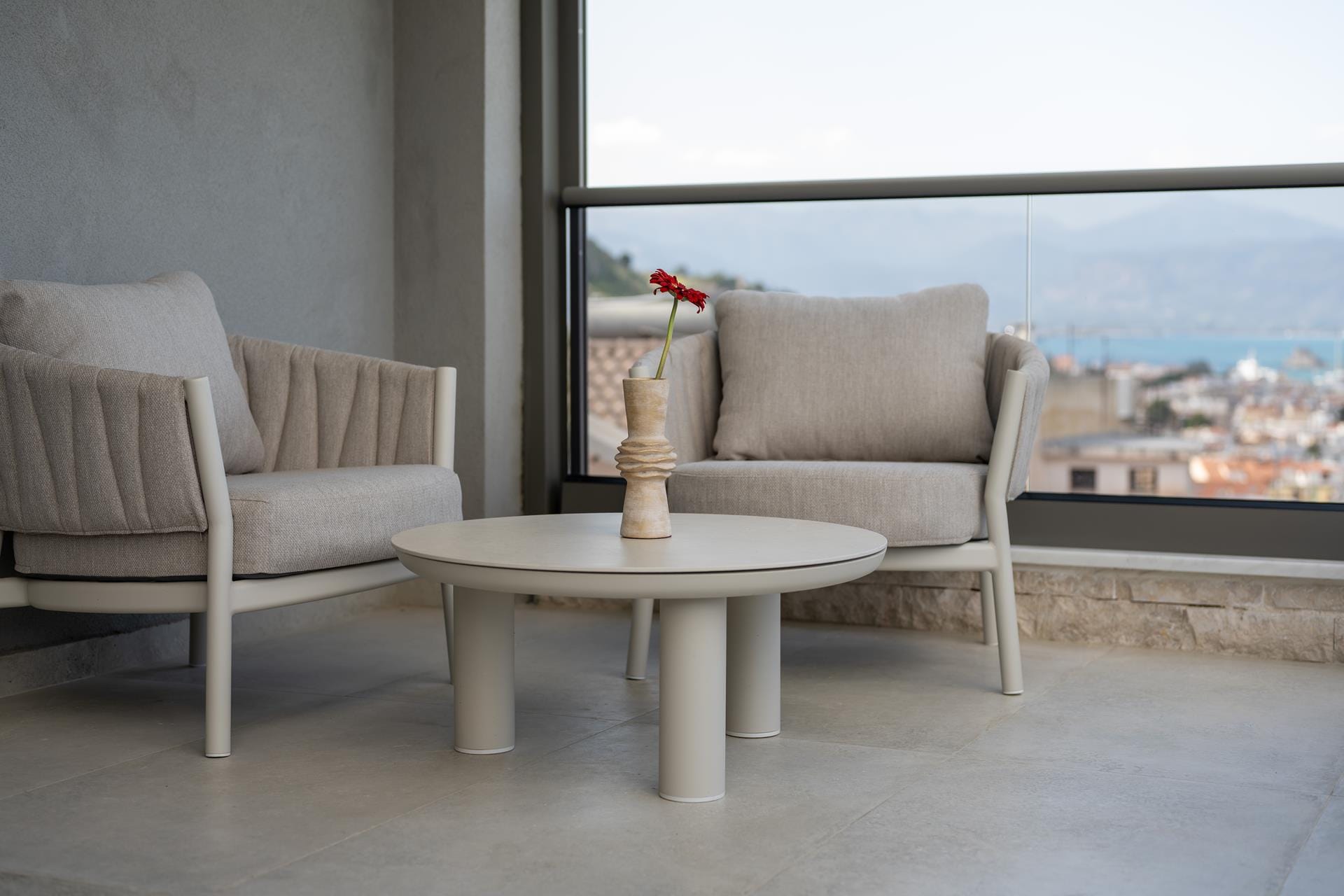 a vase with flowers on a table