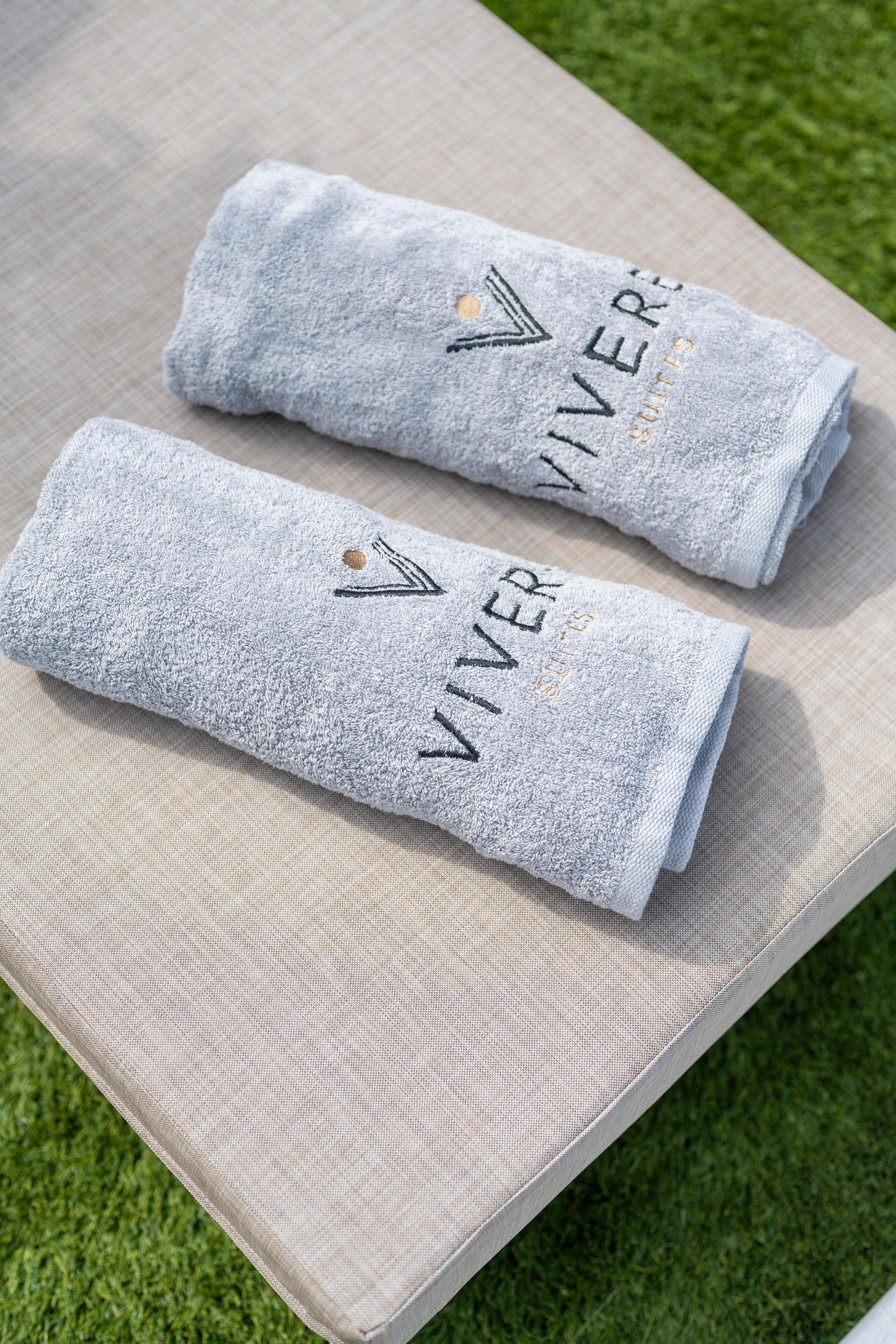 a couple of white rectangular objects on a wooden surface