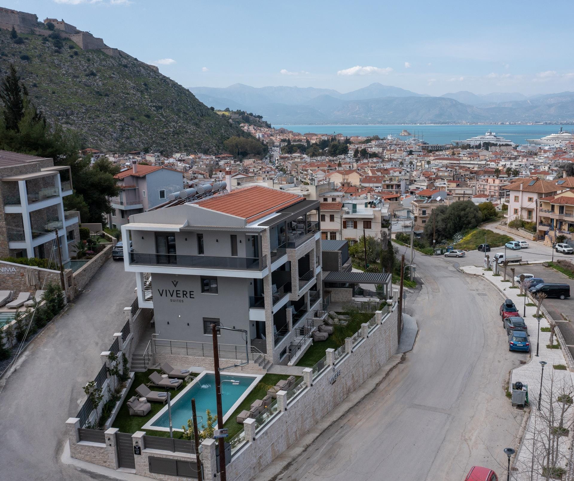 a road with buildings and cars on it
