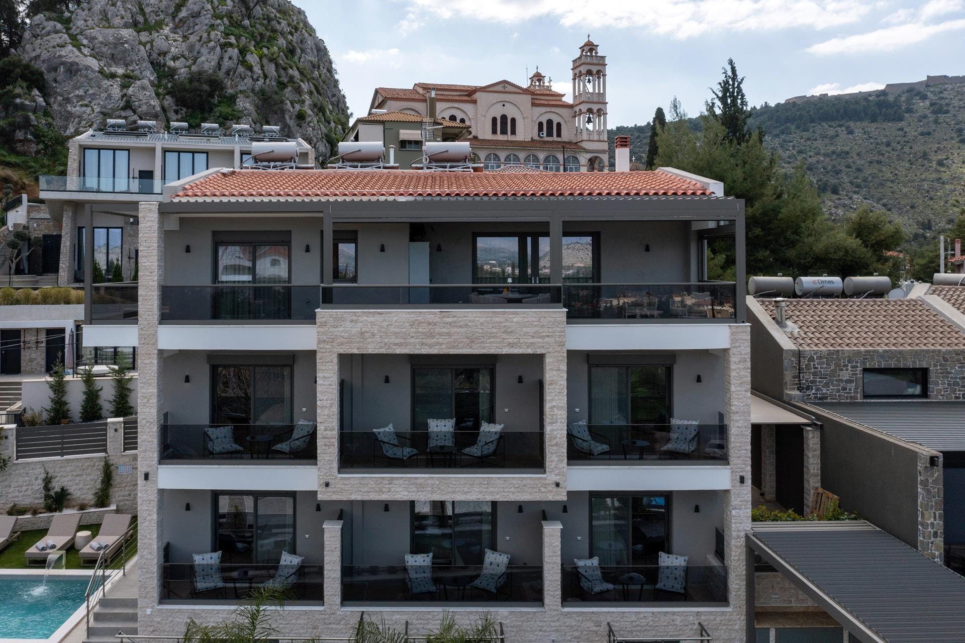 a building with a pool in the front