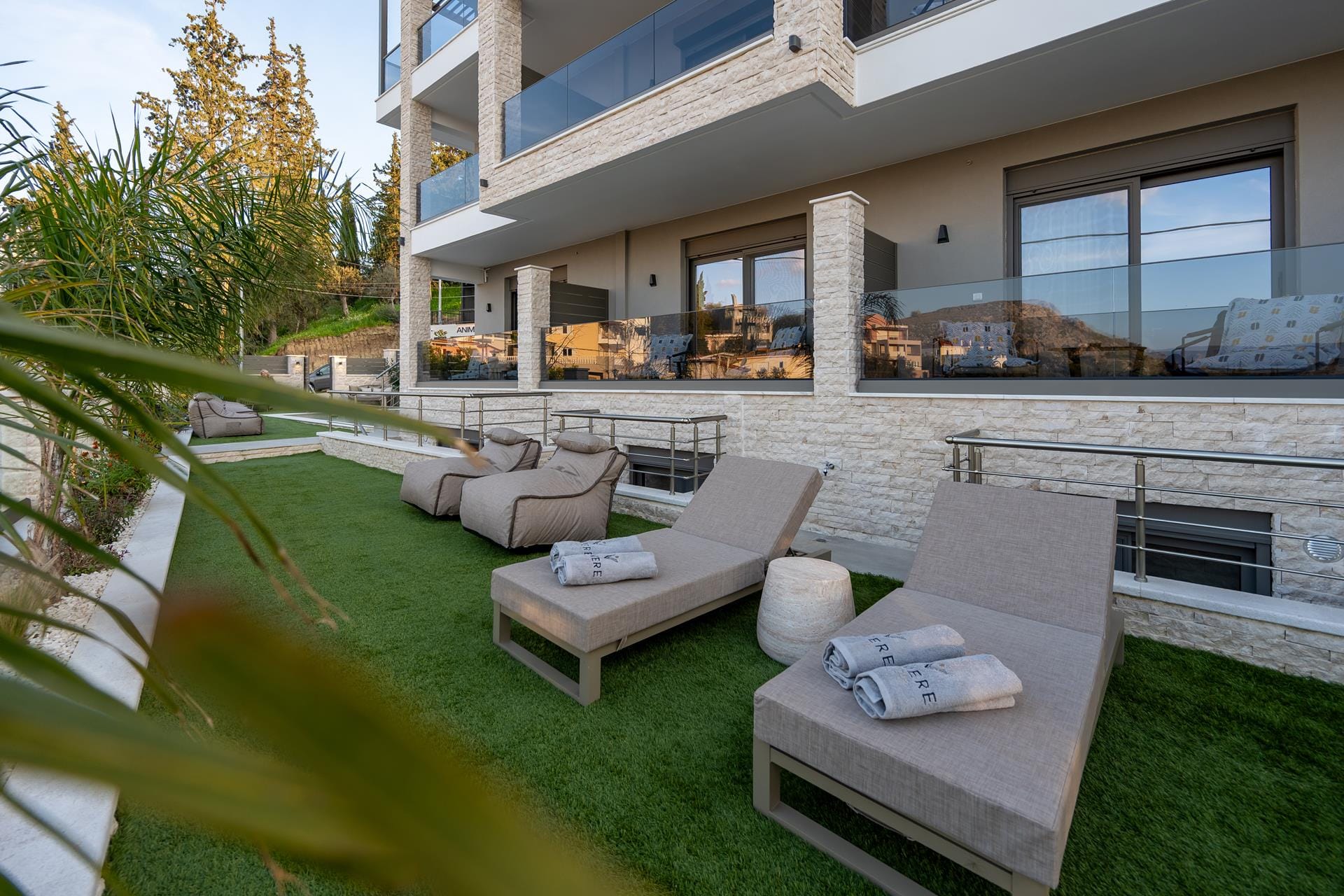 a house with a deck and chairs