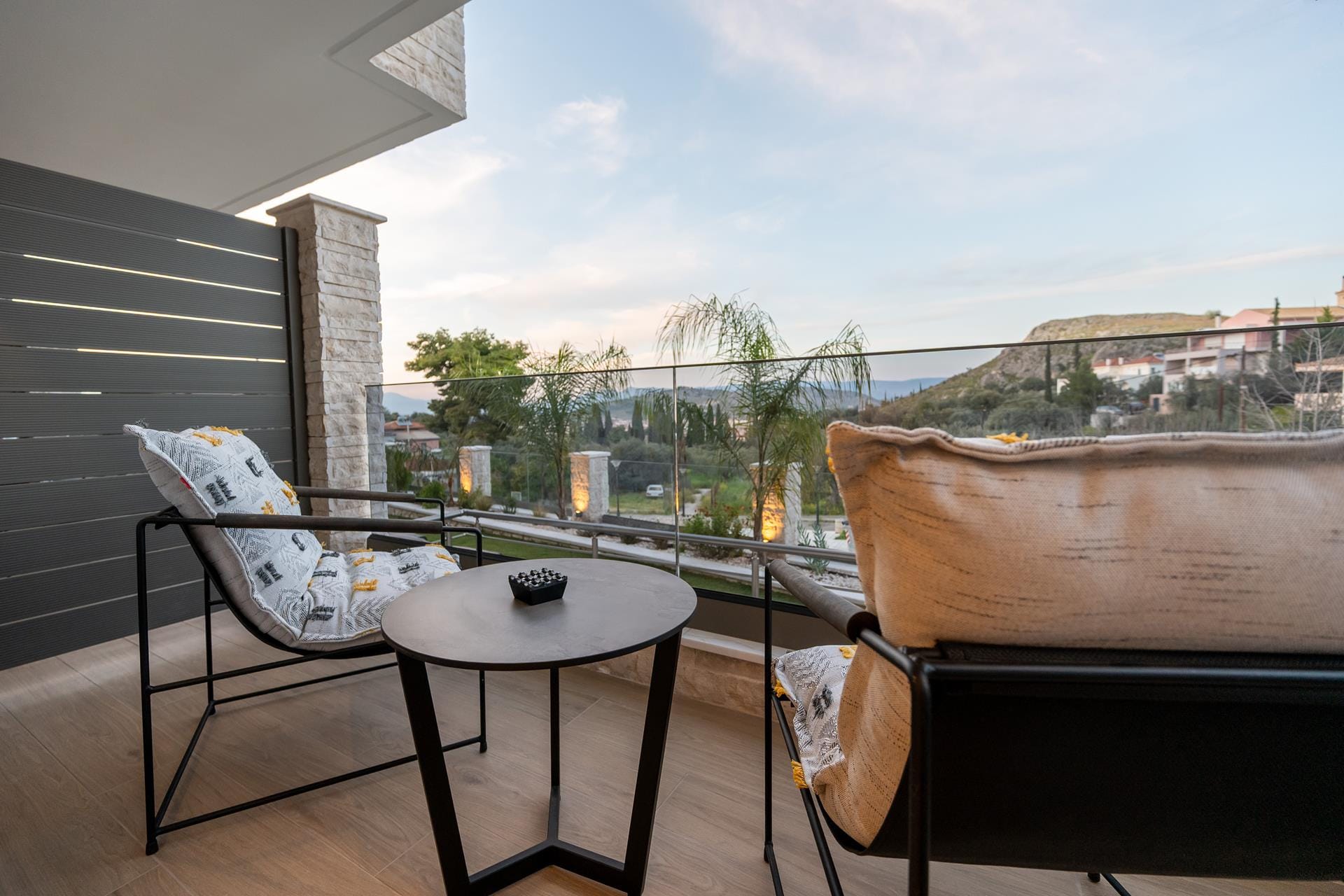 a table and chairs on a deck