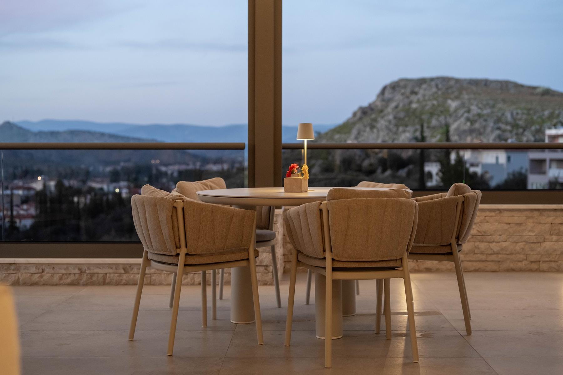a table and chairs on a deck