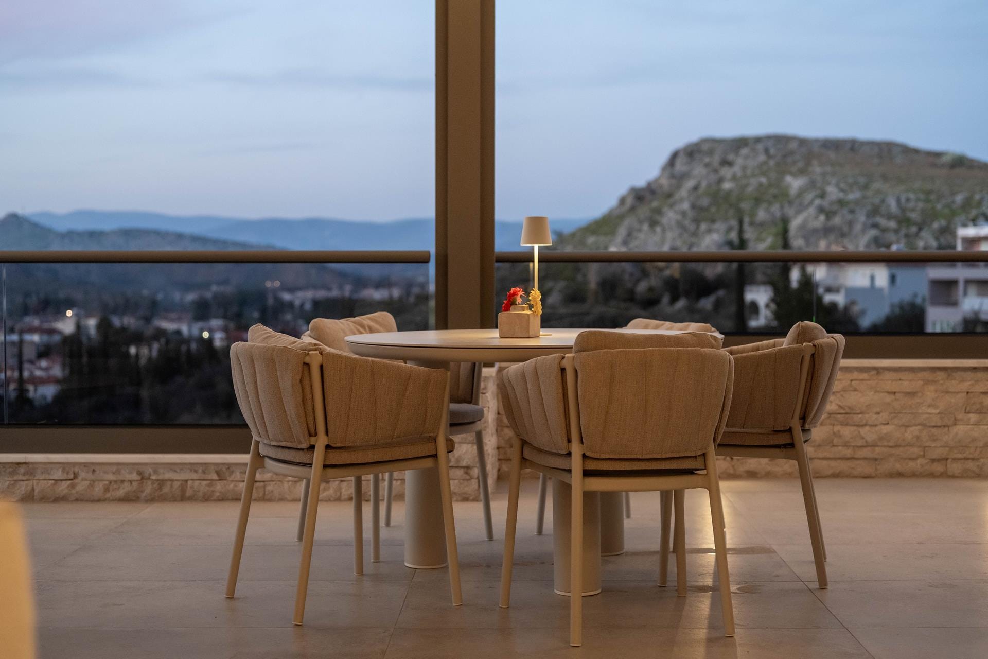a table and chairs on a deck