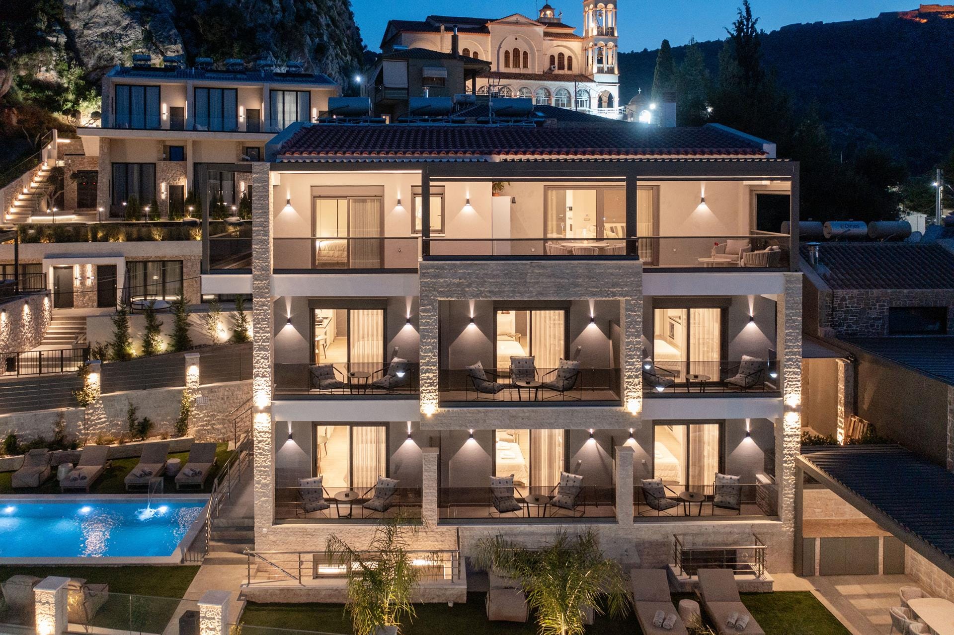 a building with a pool in the front