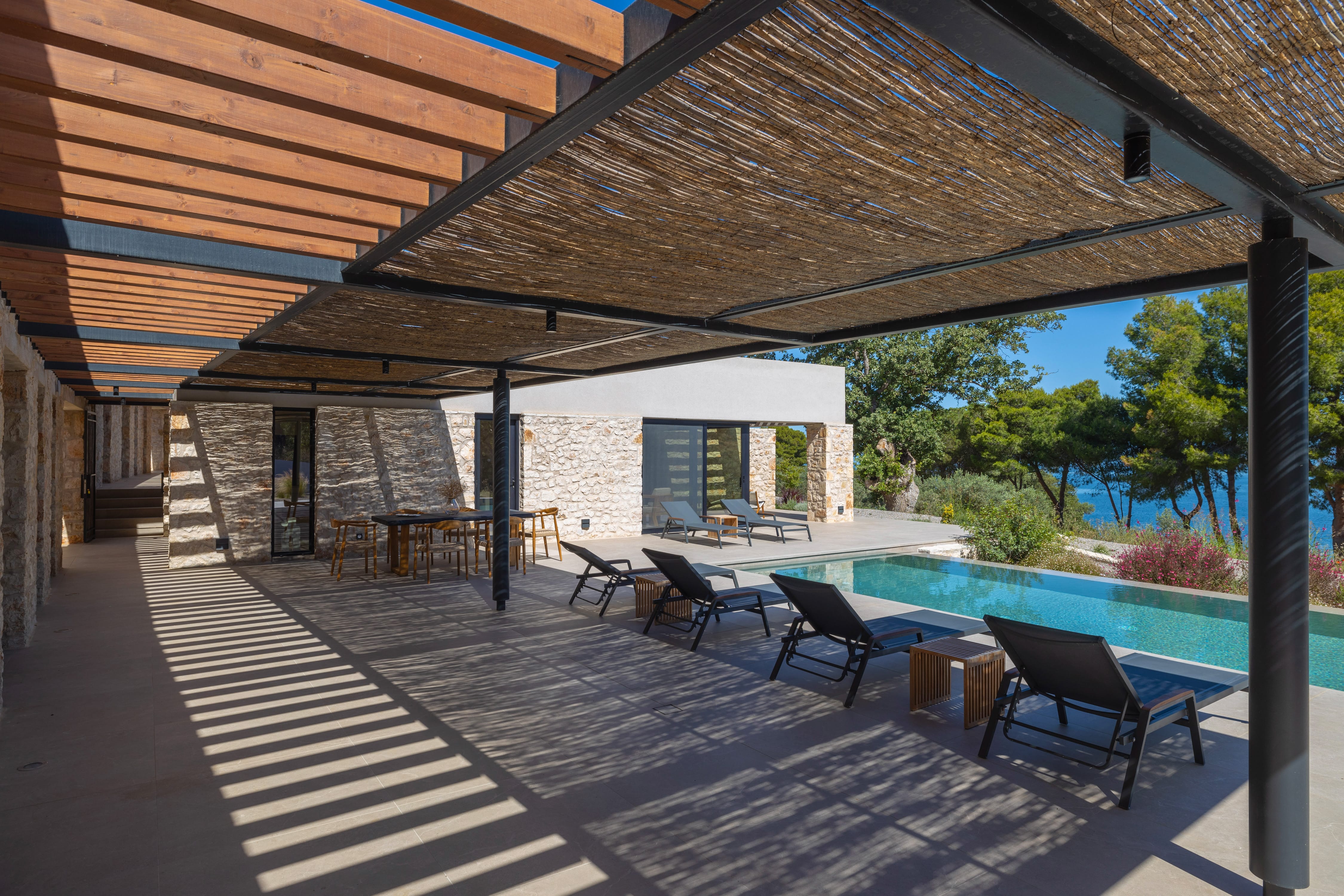 a patio with tables and chairs