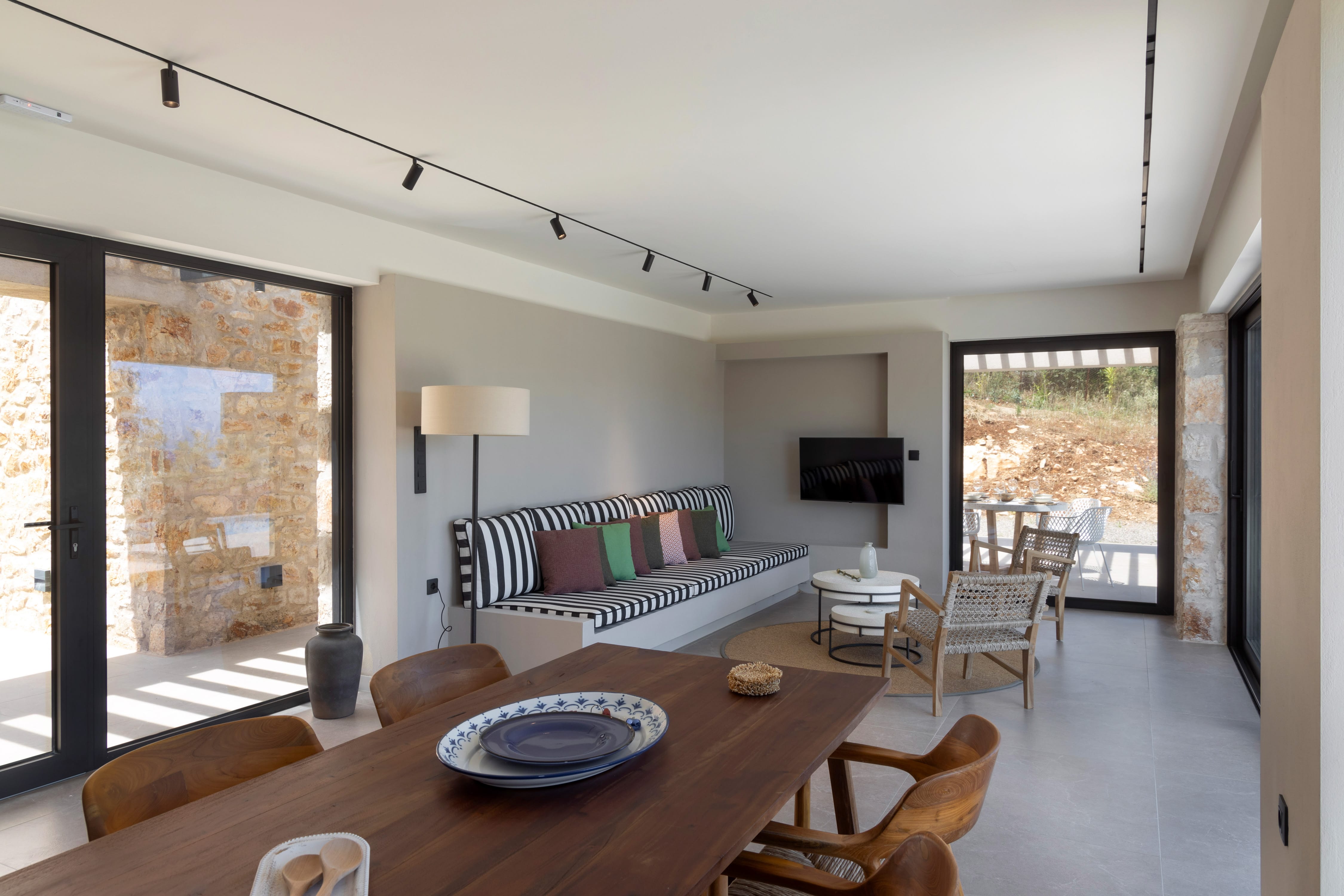 a living room with a large glass door