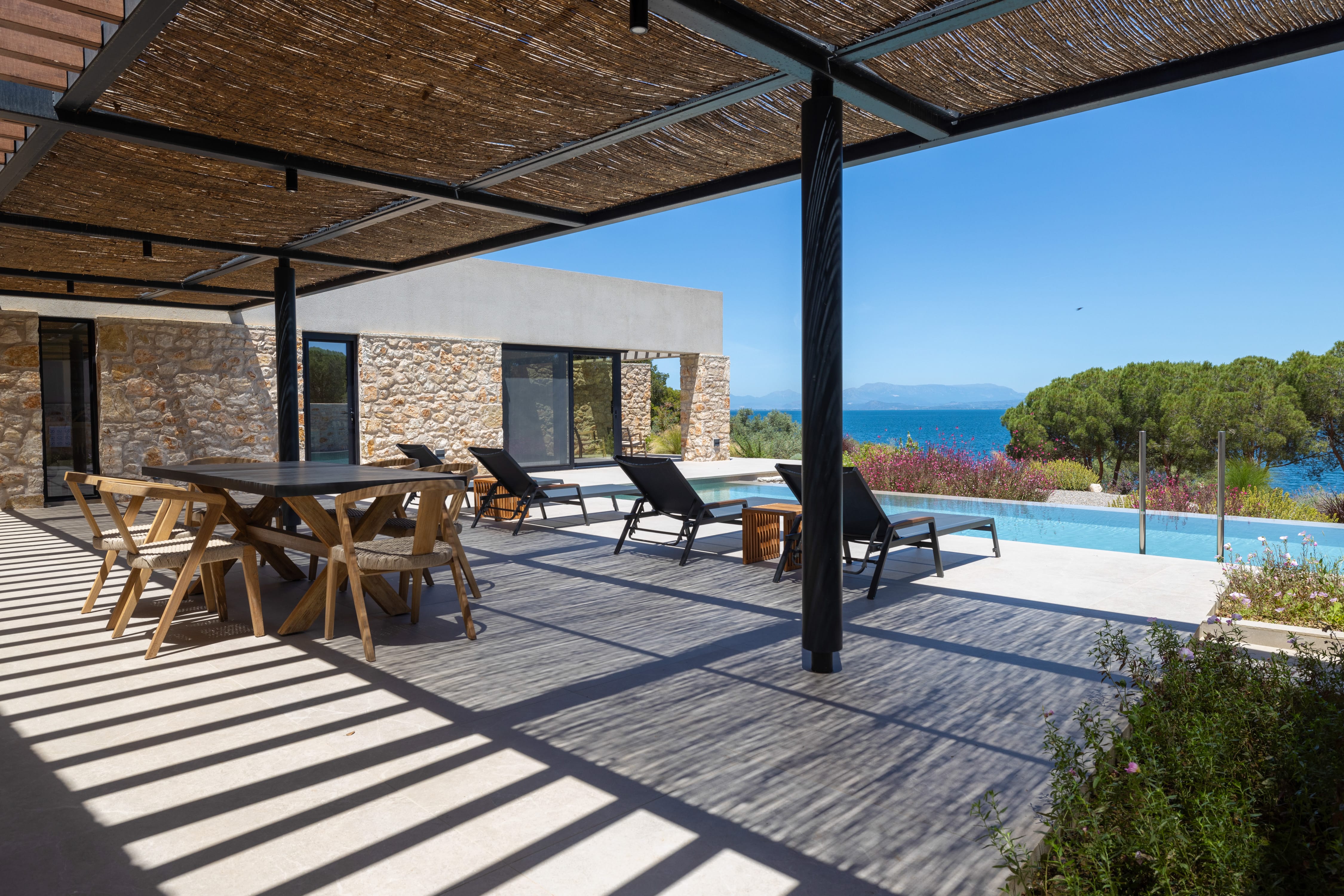 a patio with tables and chairs