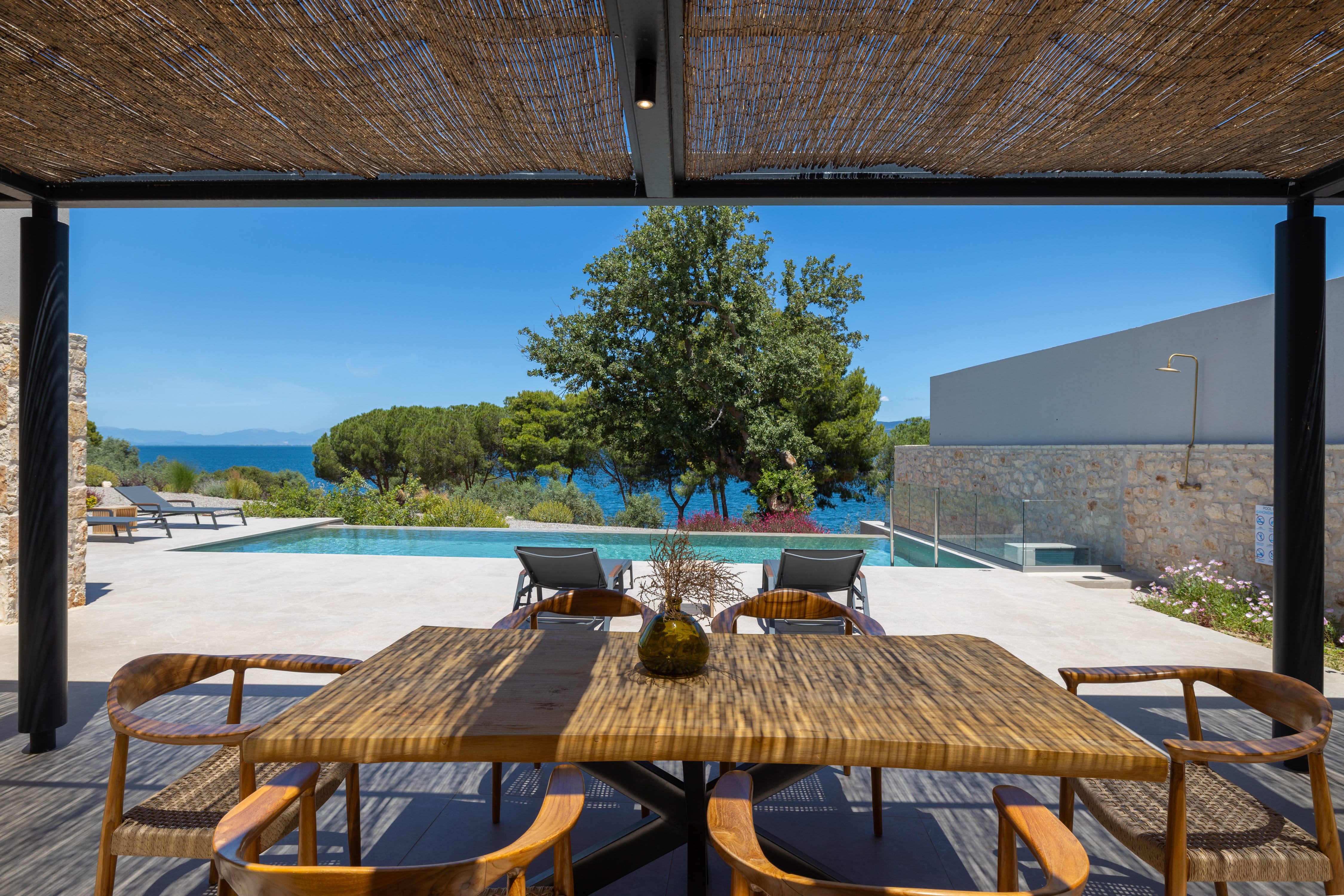 a table with chairs and a tree