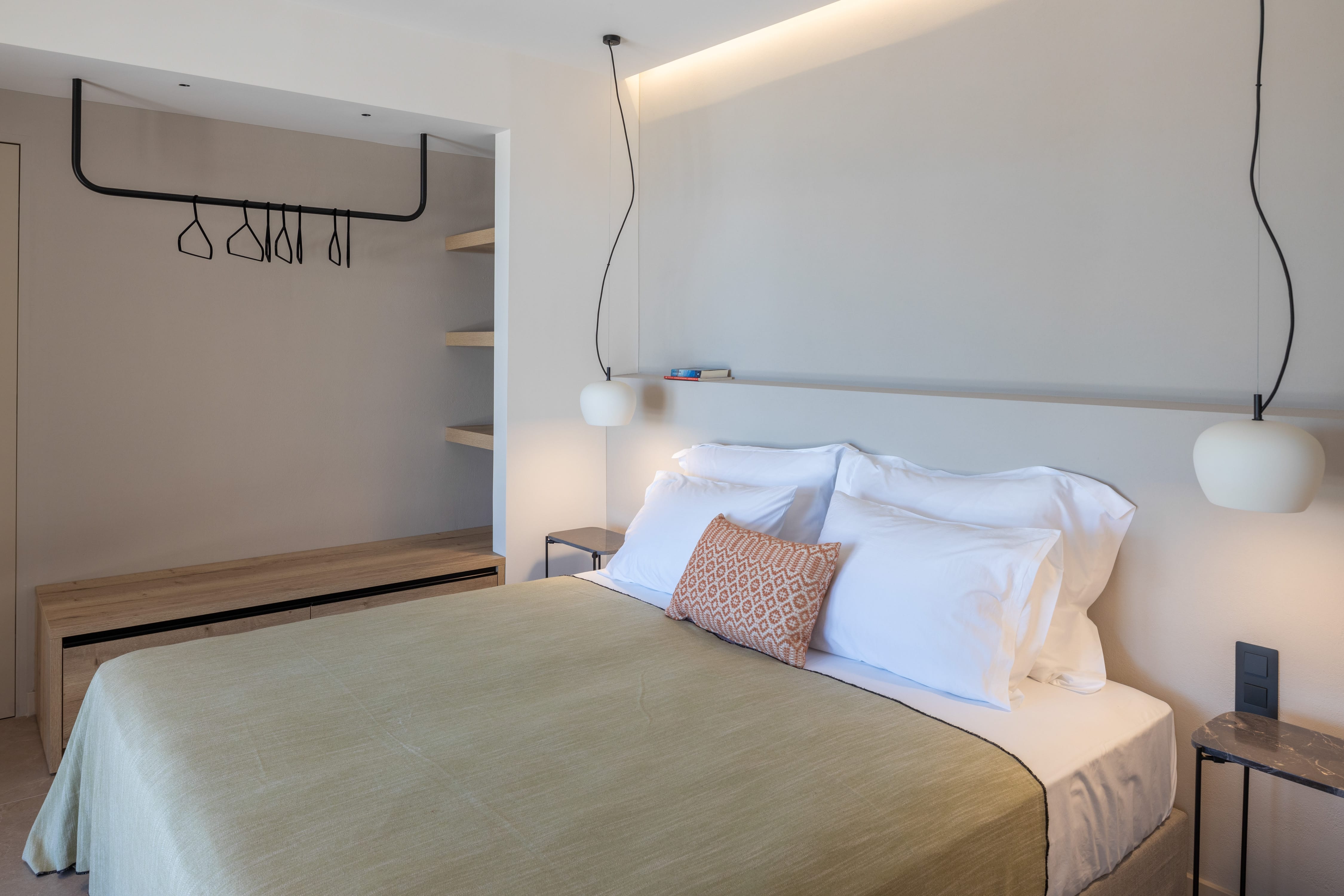 a bed with a white sheet