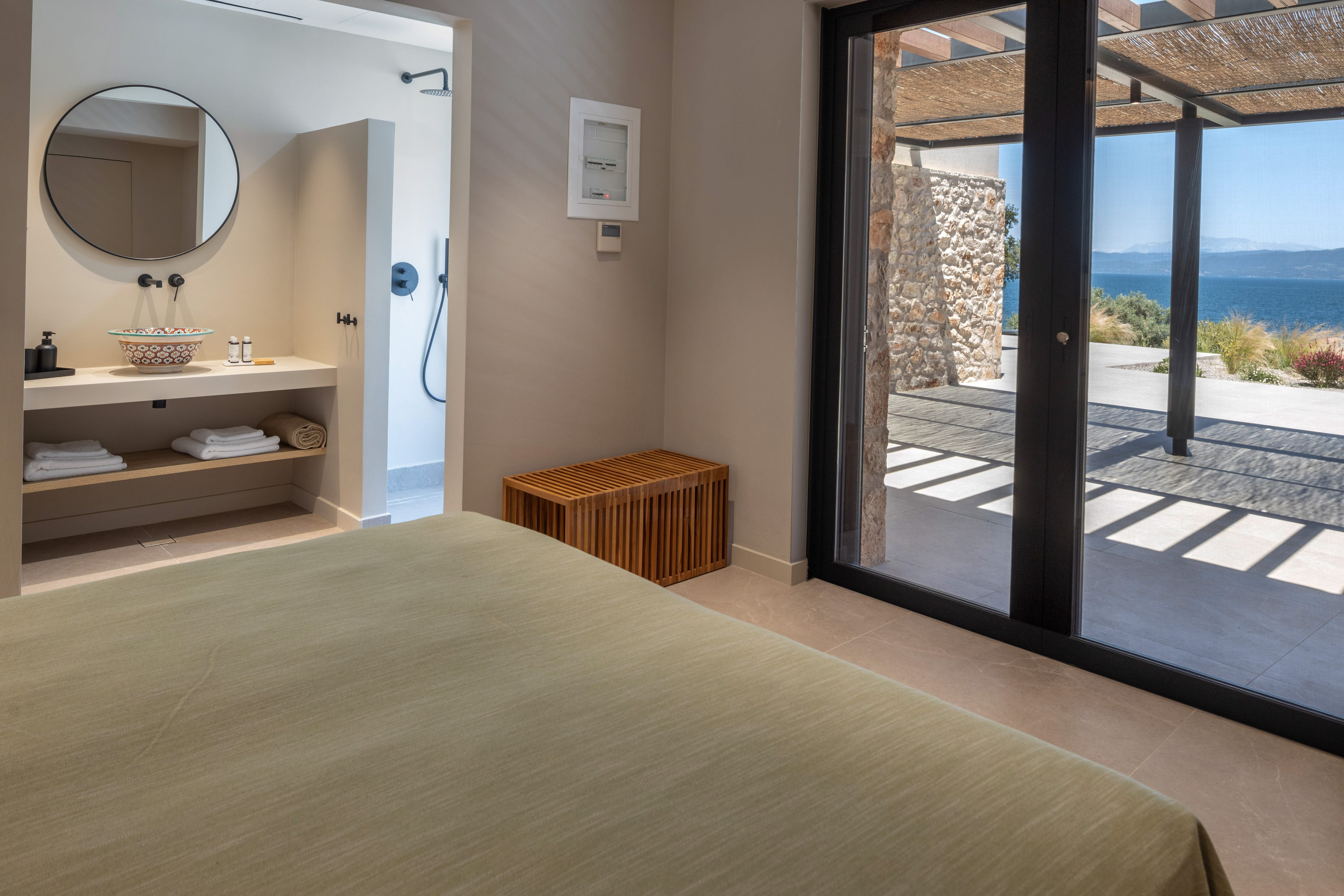 a bedroom with a large window