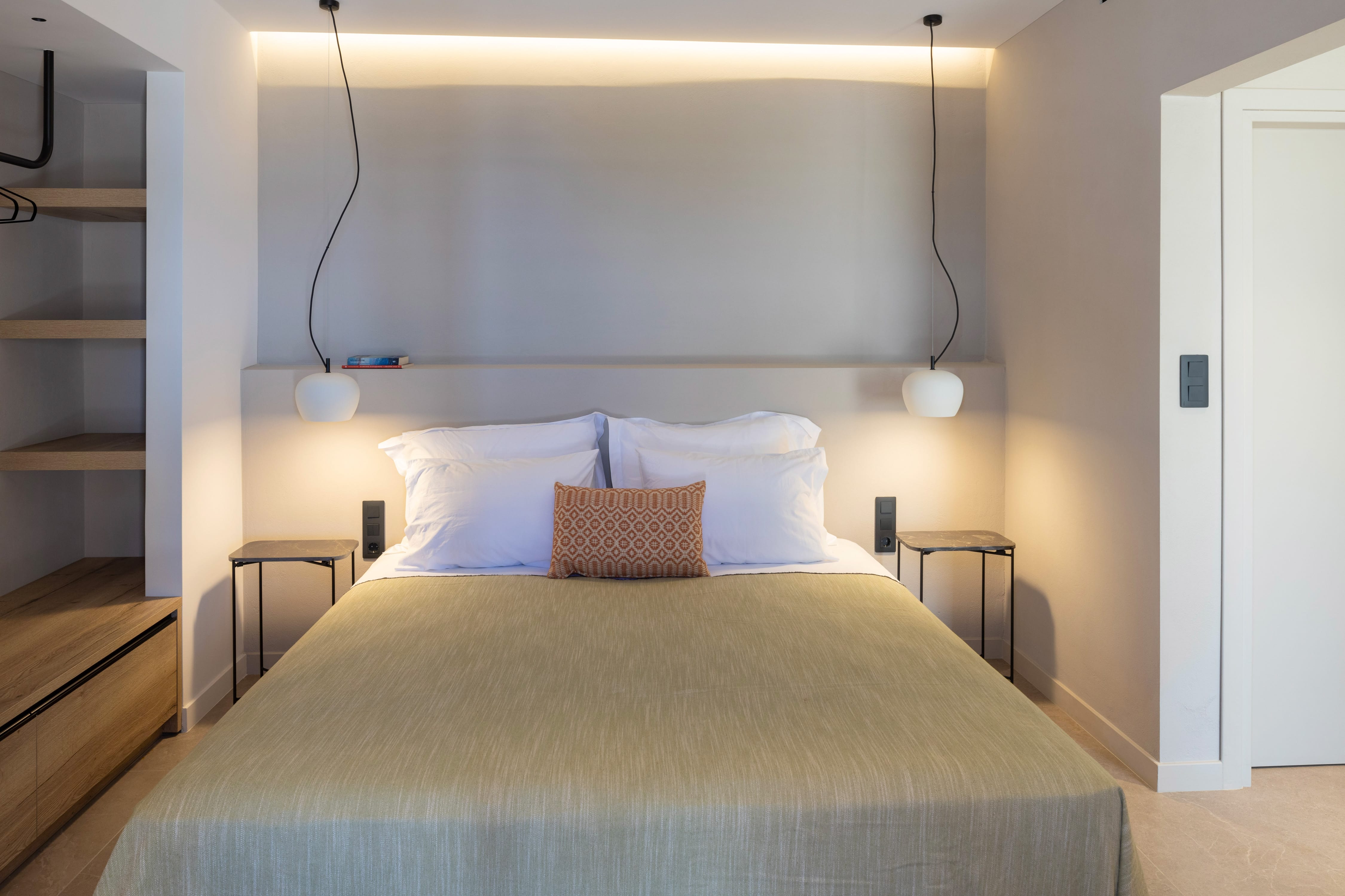 a bed with a white sheet