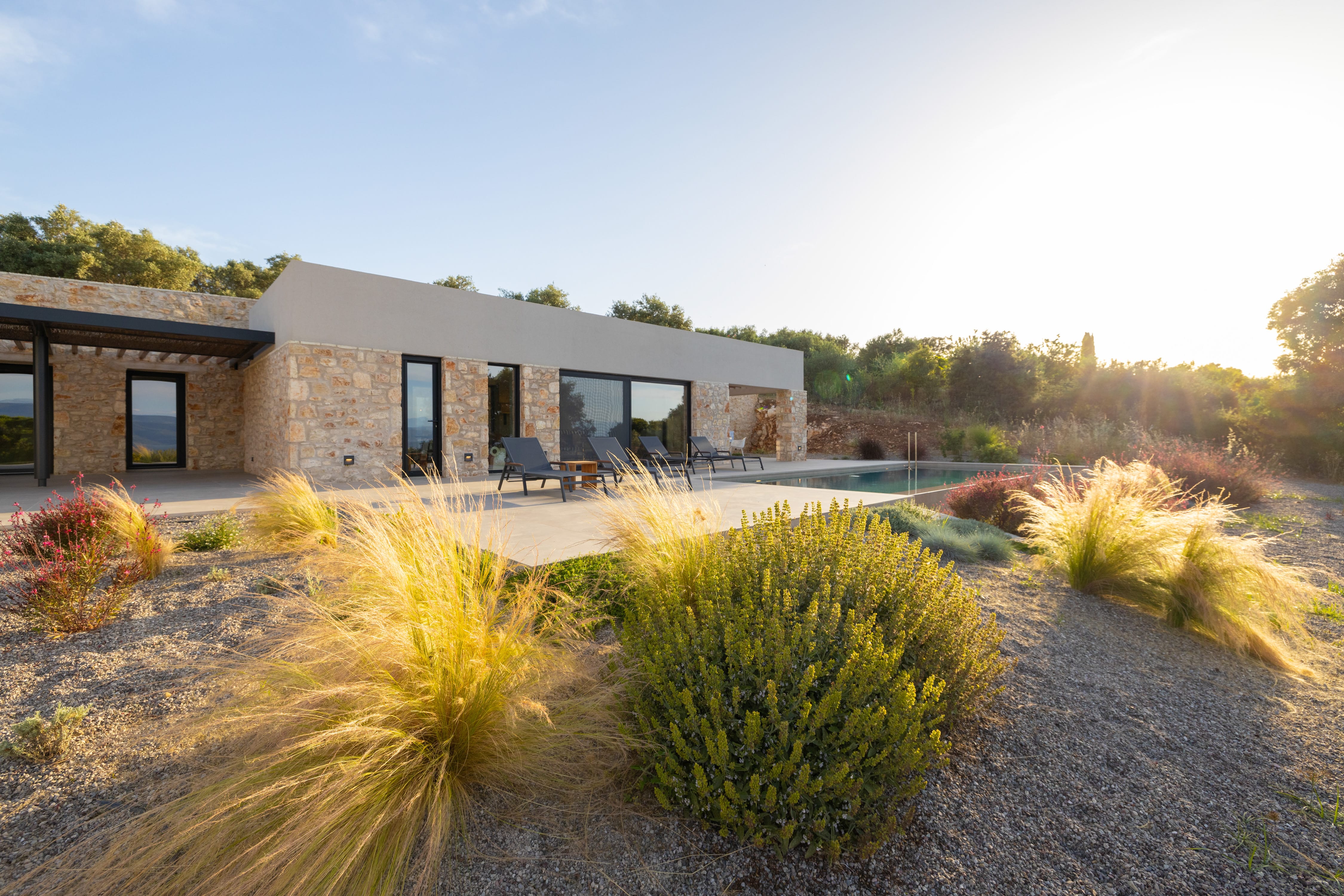 a house with a gravel driveway