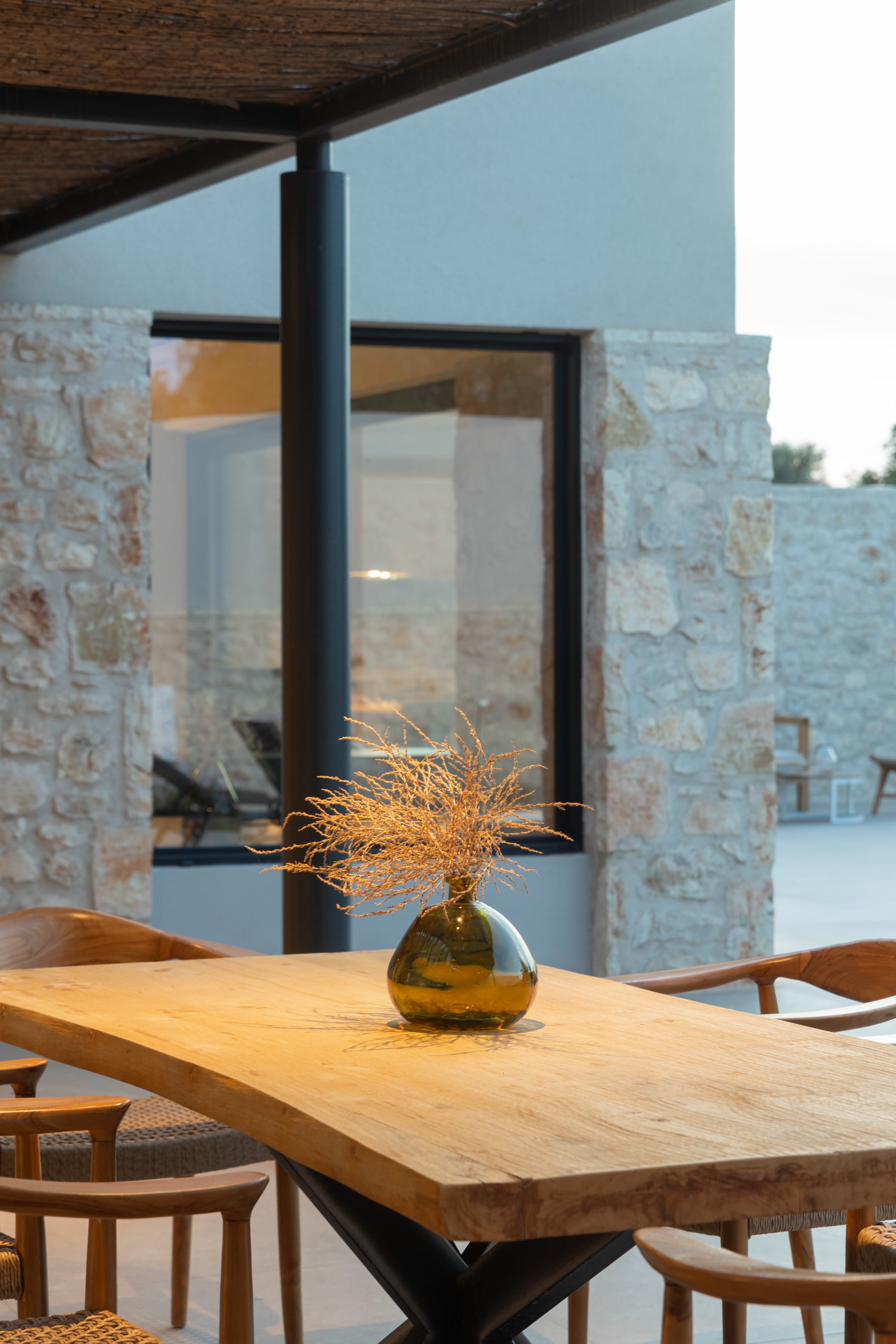 a table with a vase of flowers