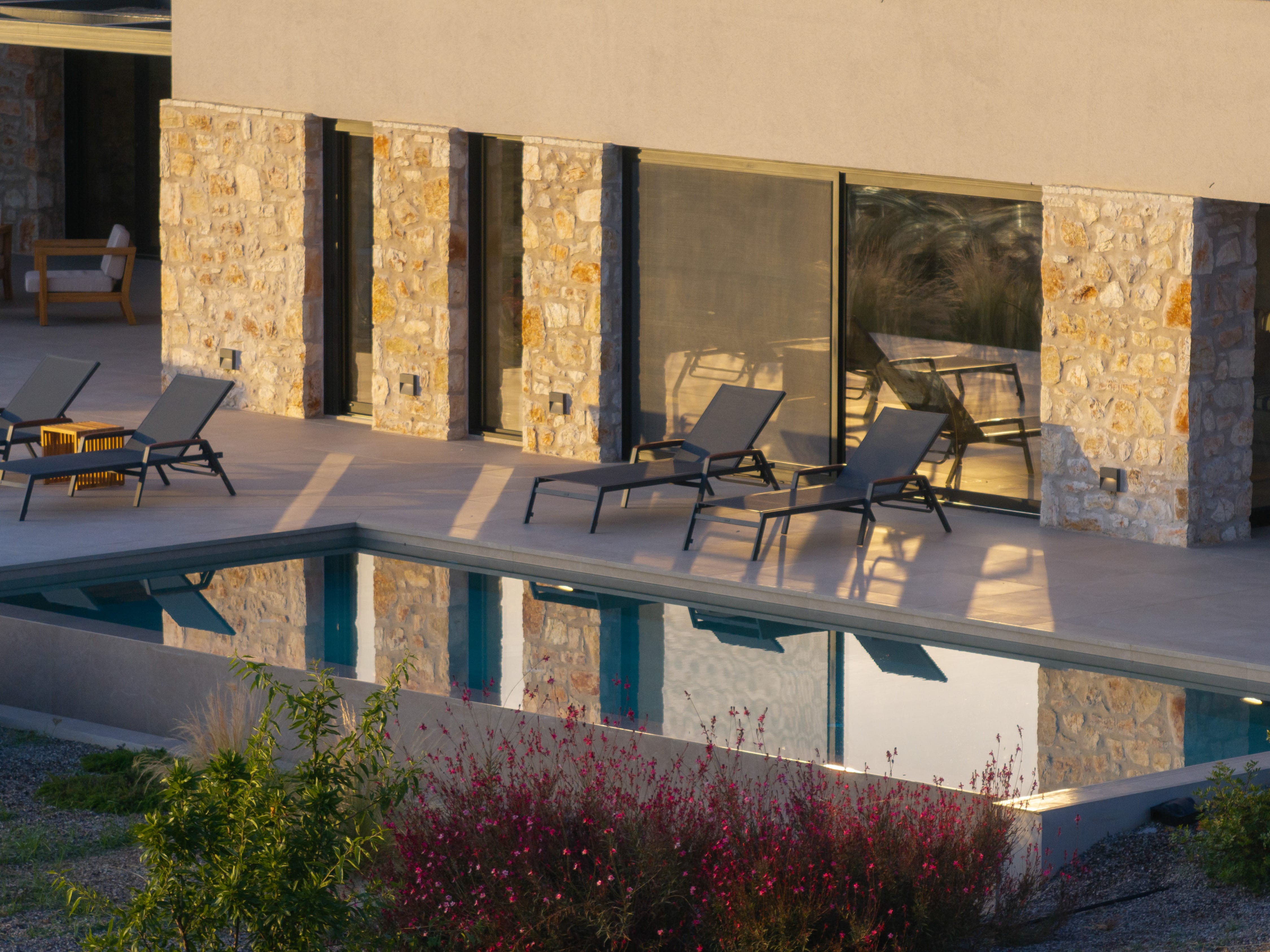 a deck with chairs and tables