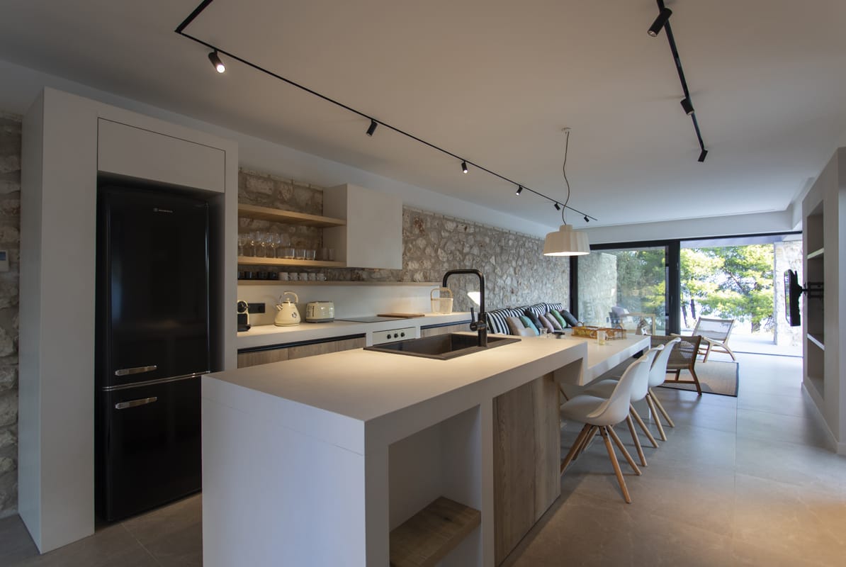 a kitchen with a large island