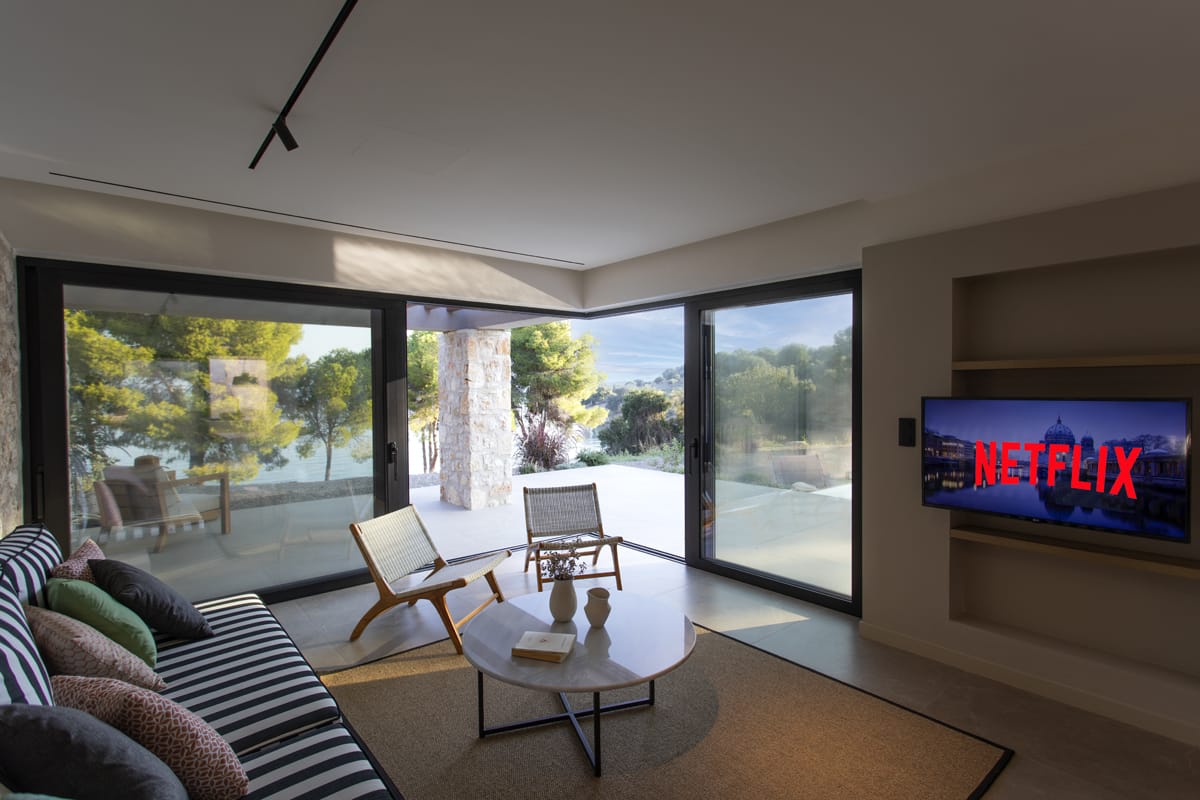 a living room with a tv and a table