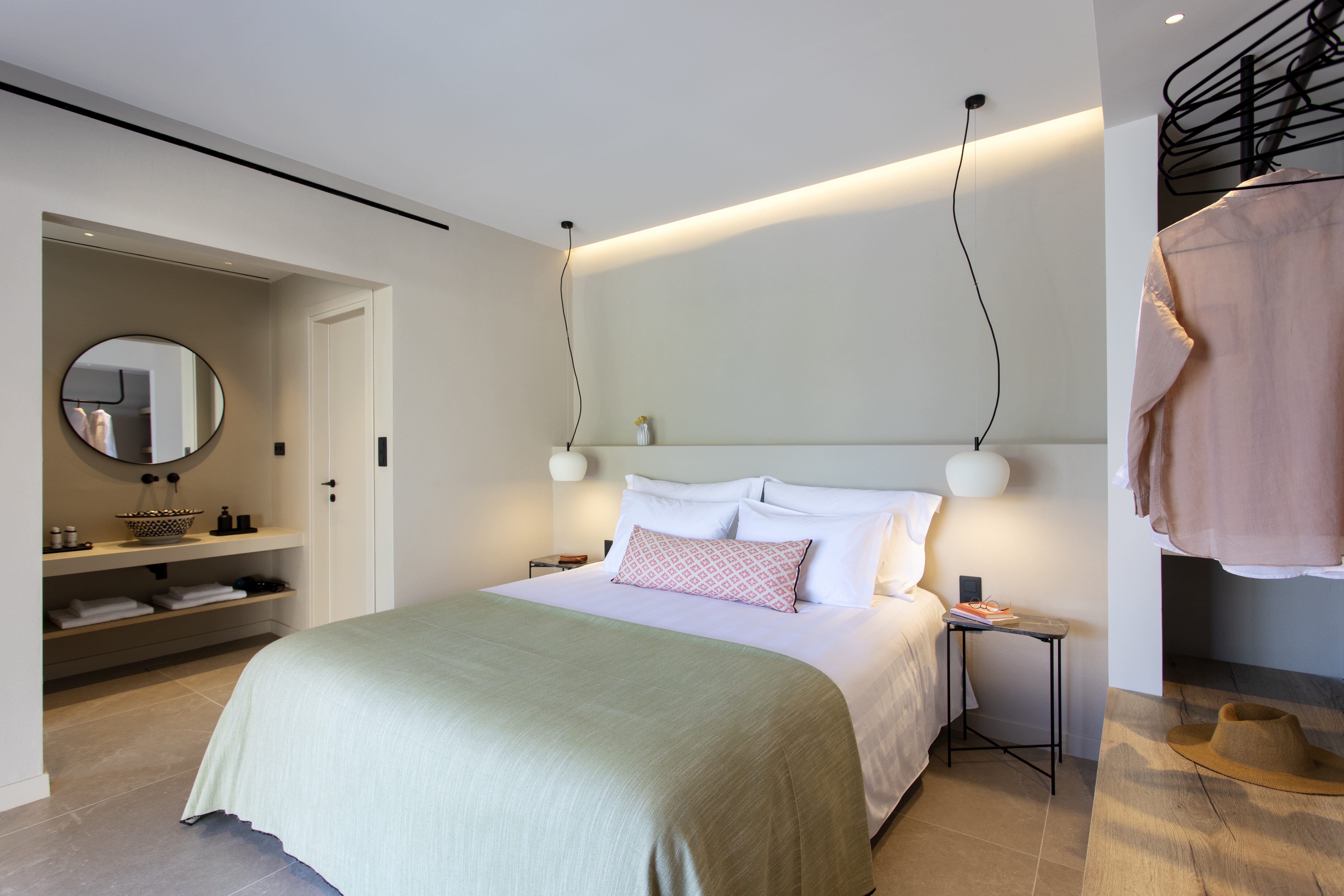 a bed with a white bed spread