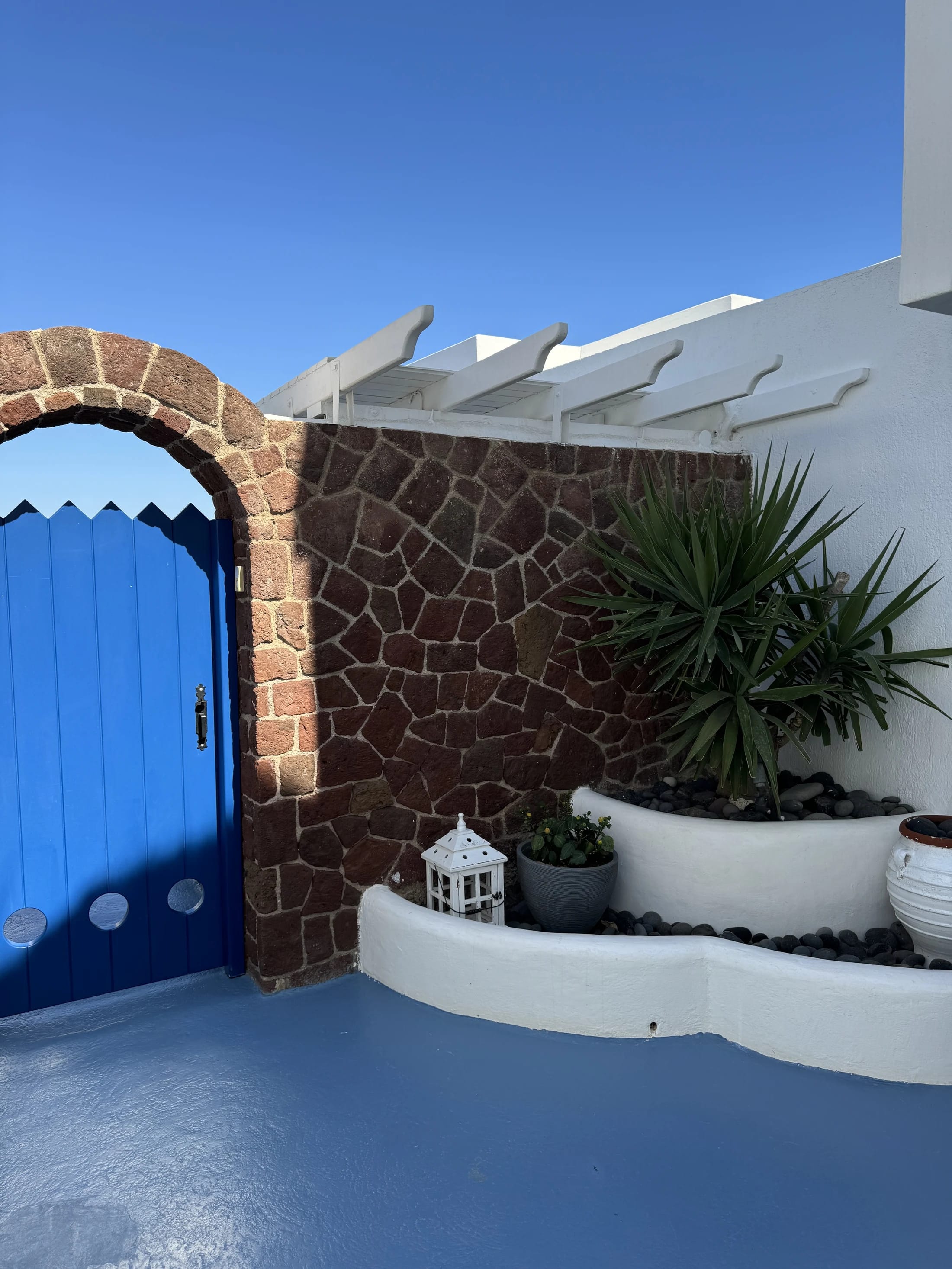a blue door and a white couch