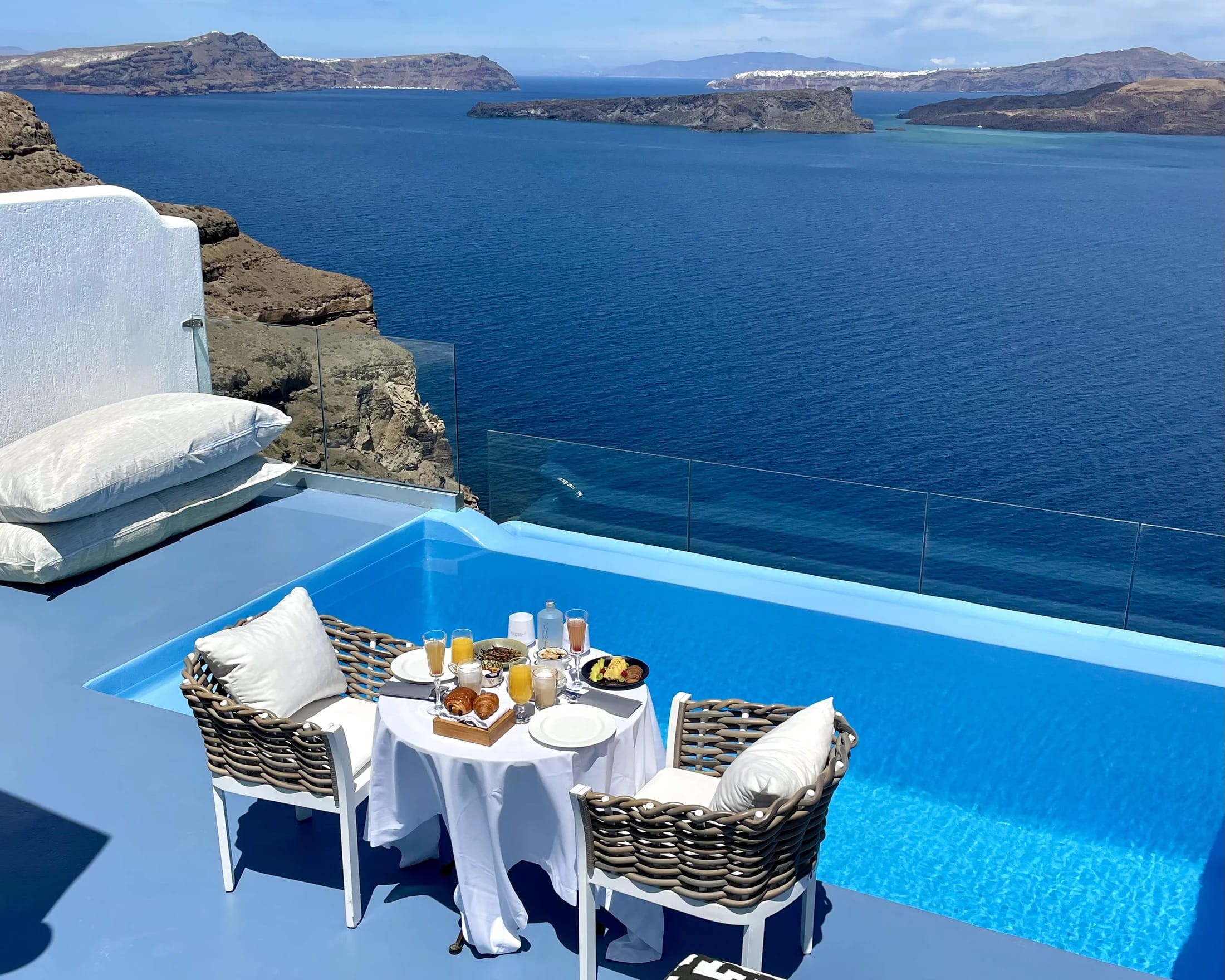 a table and chairs on a boat
