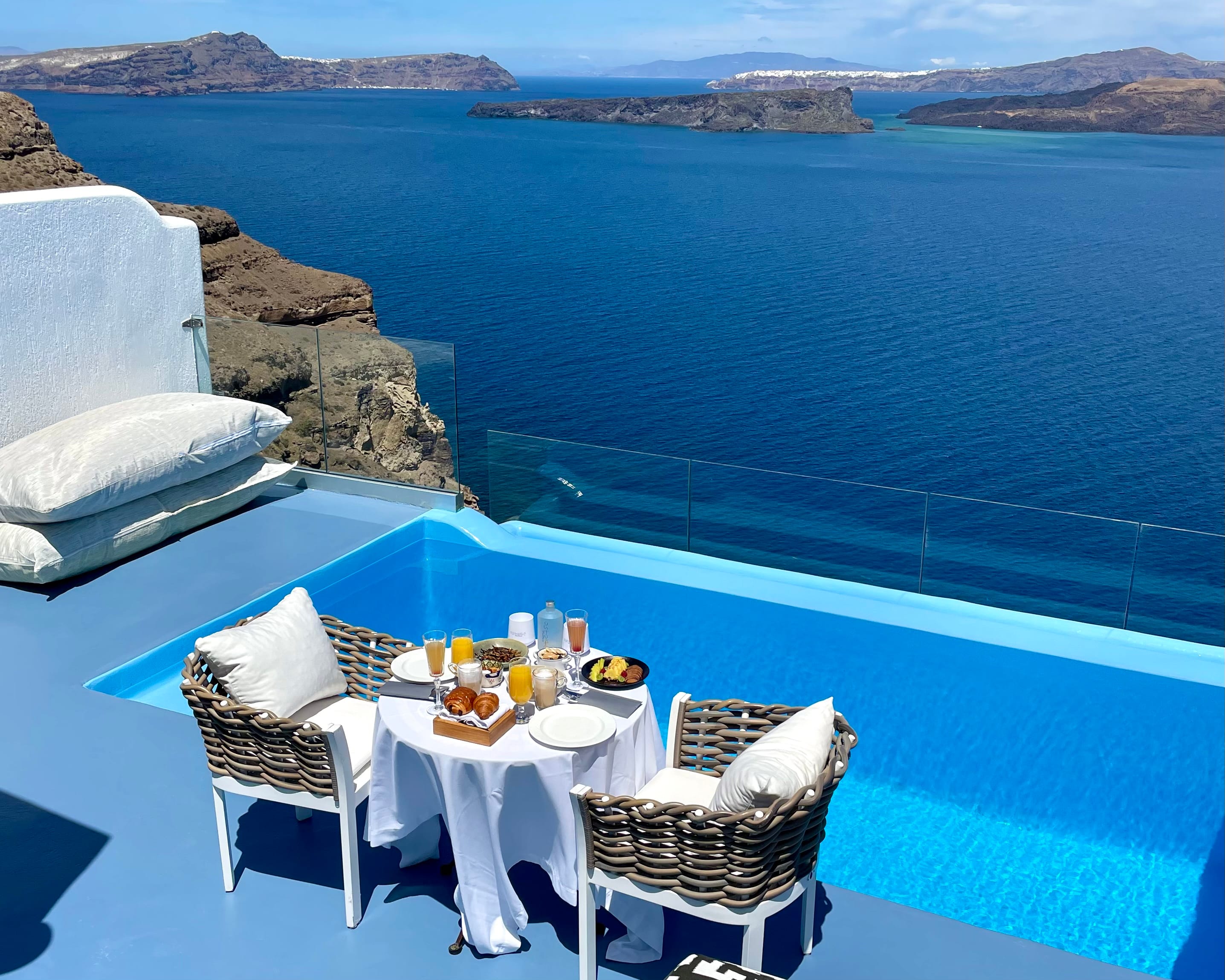 a table and chairs on a boat