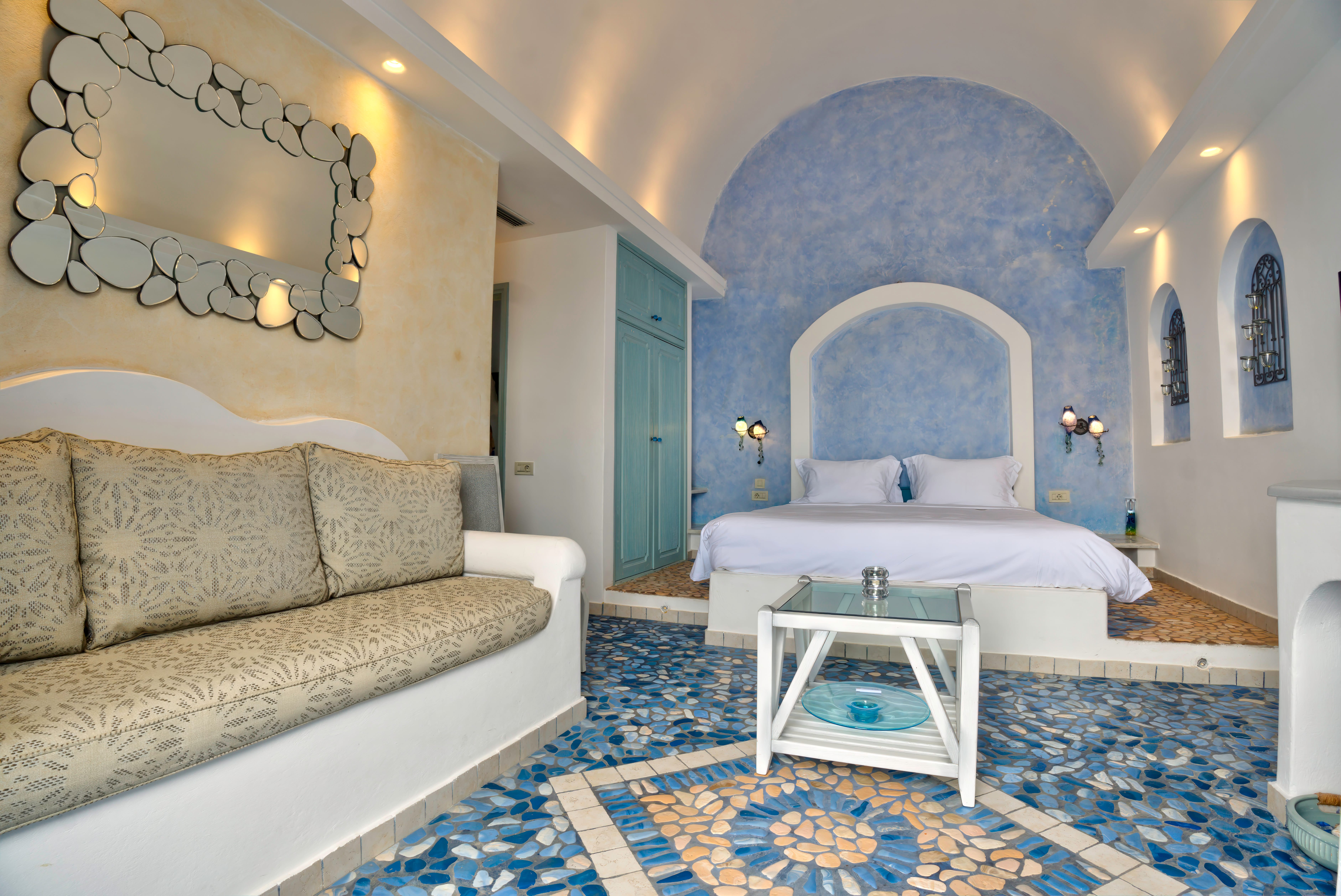 a room with a bed and a couch