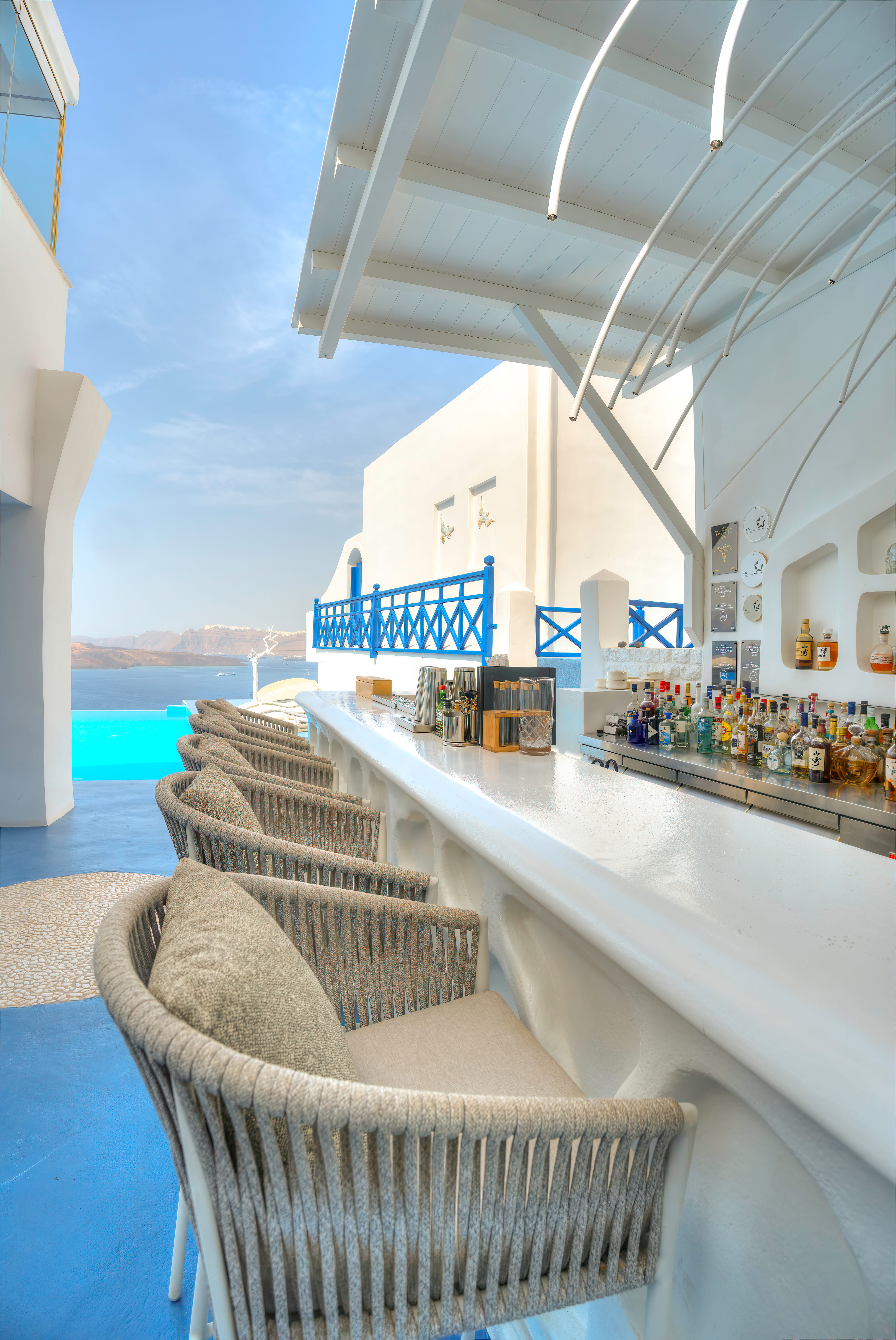 a bar with a bar and chairs