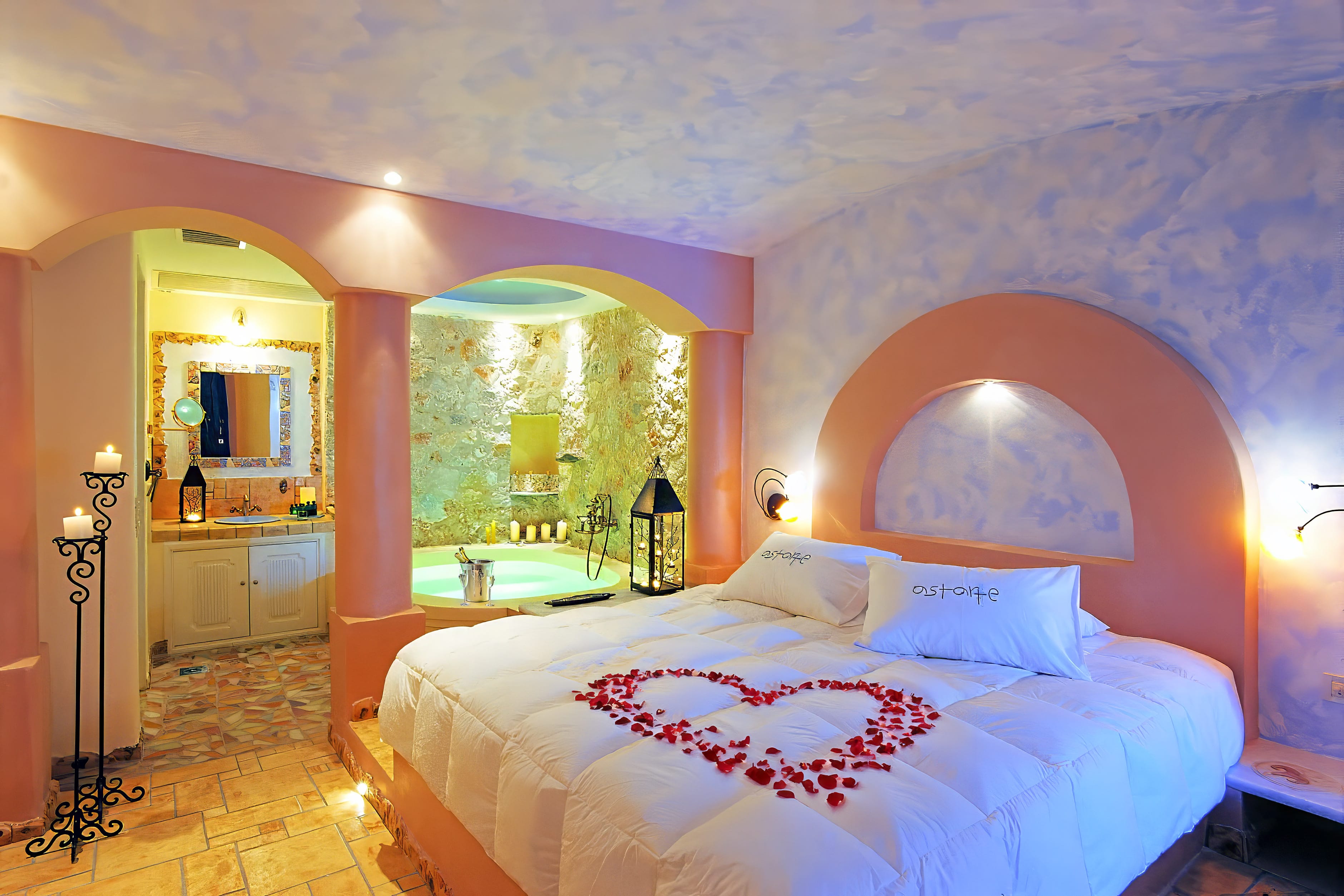 a bedroom with a large mirror