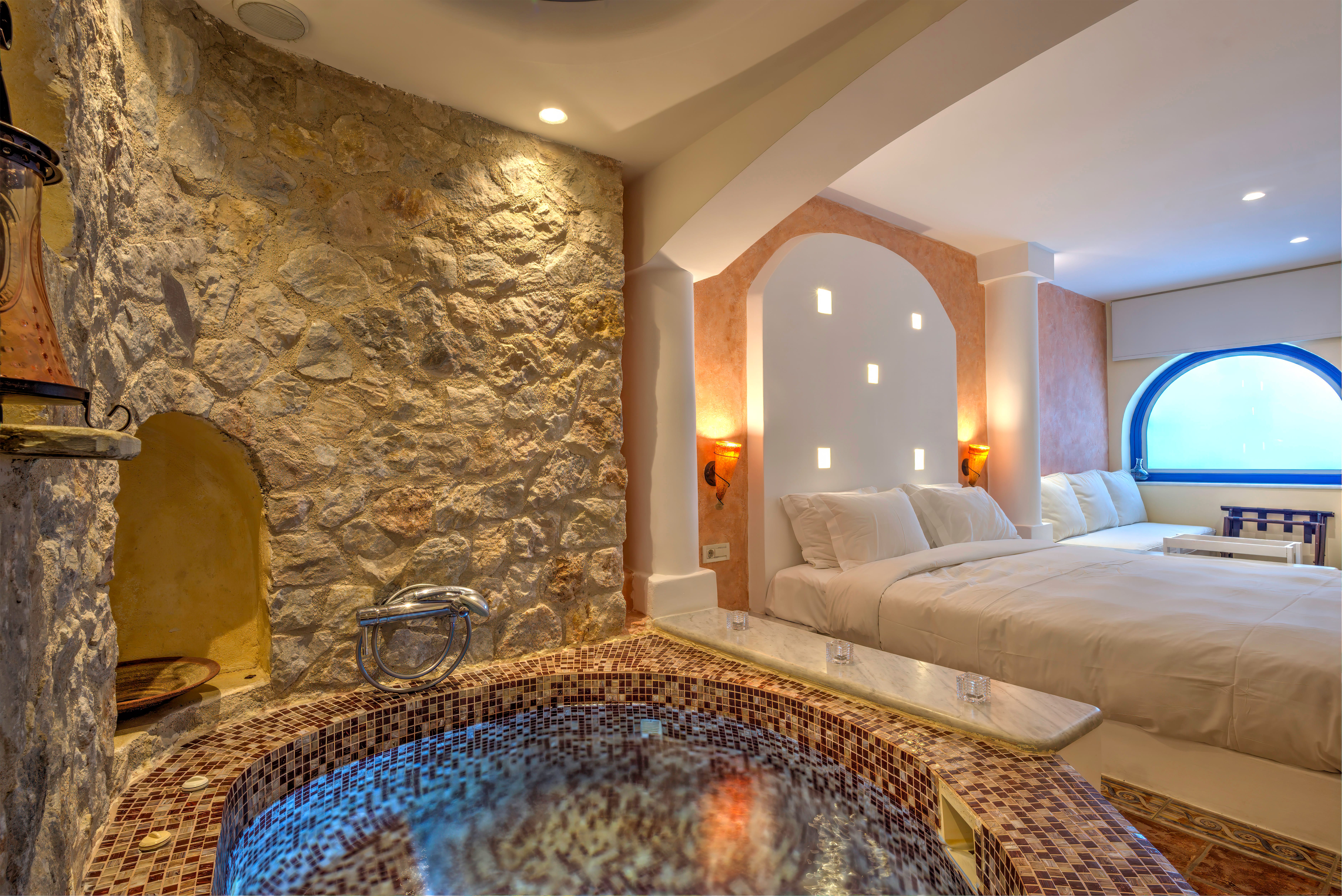 a bedroom with a large mirror