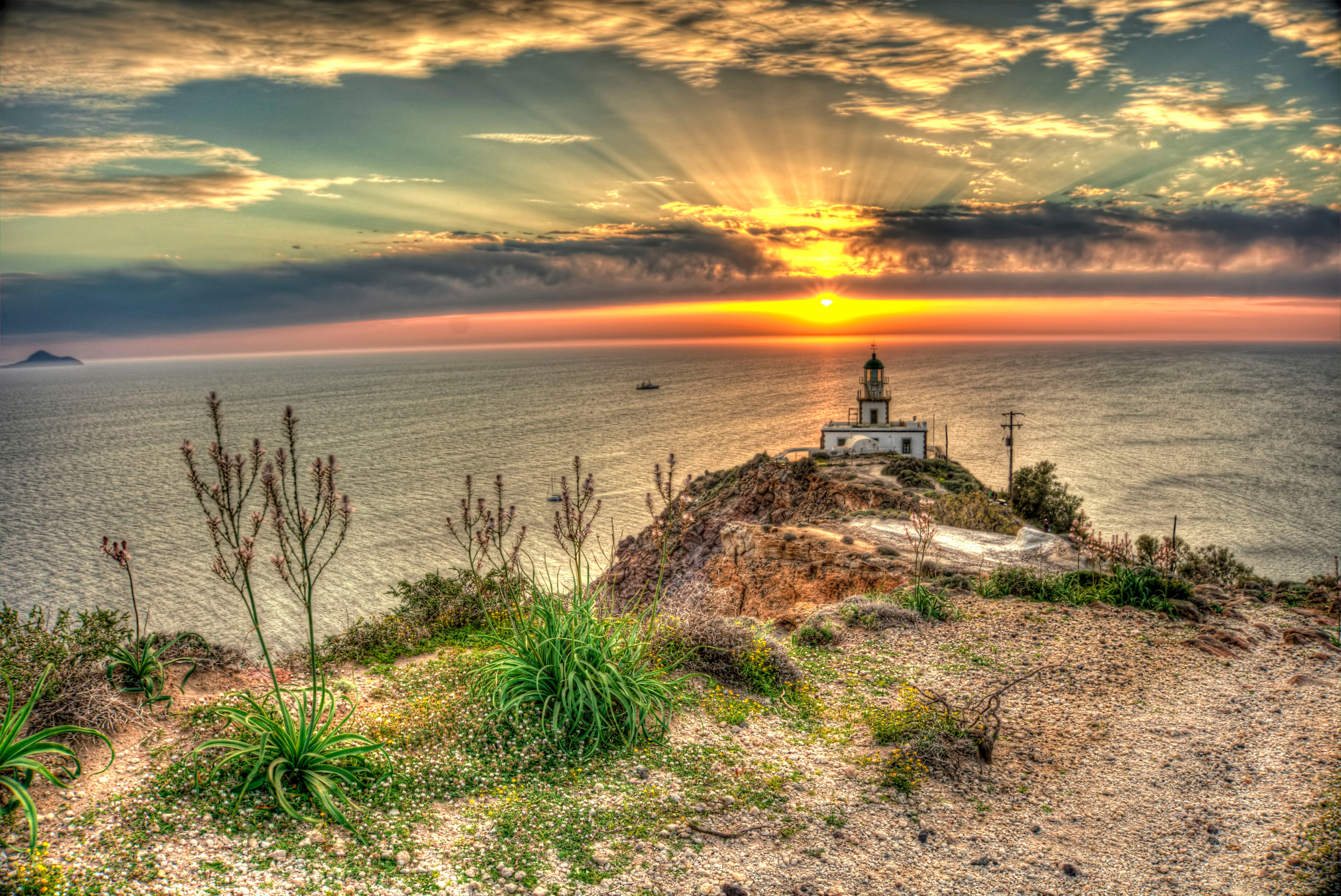 a lighthouse on a rocky shore