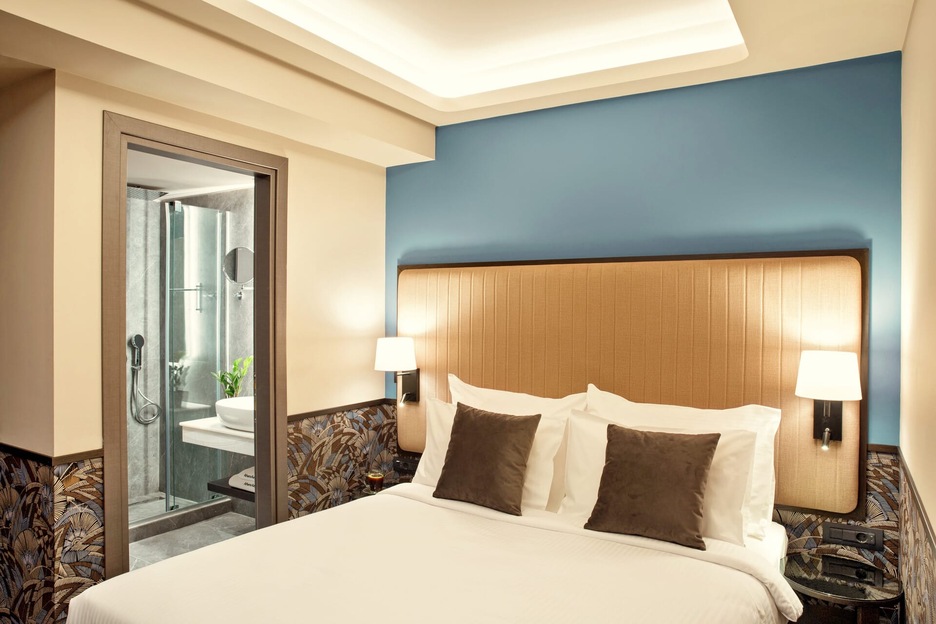 a bed with a white bed spread