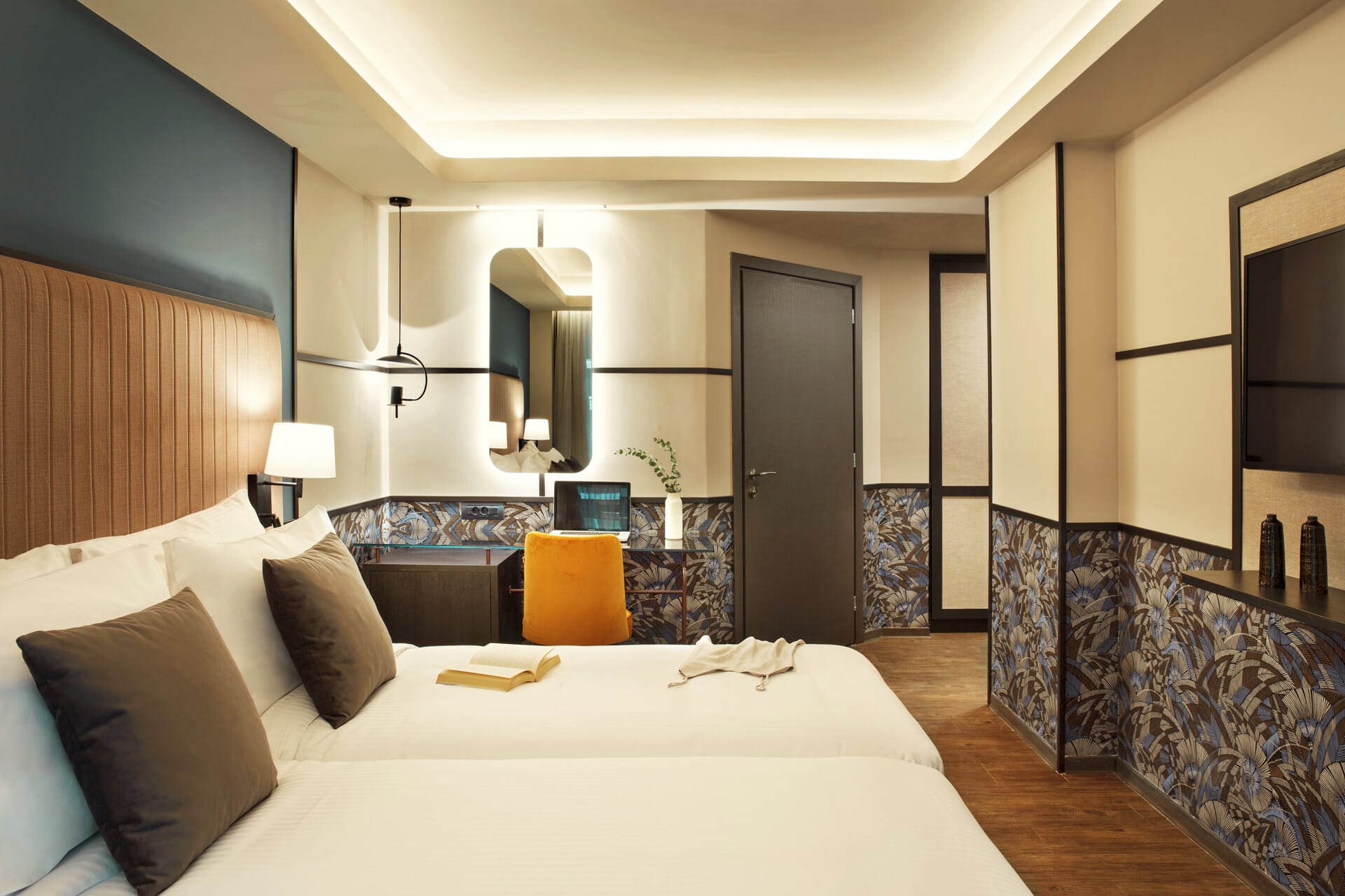 a large bedroom with a large mirror