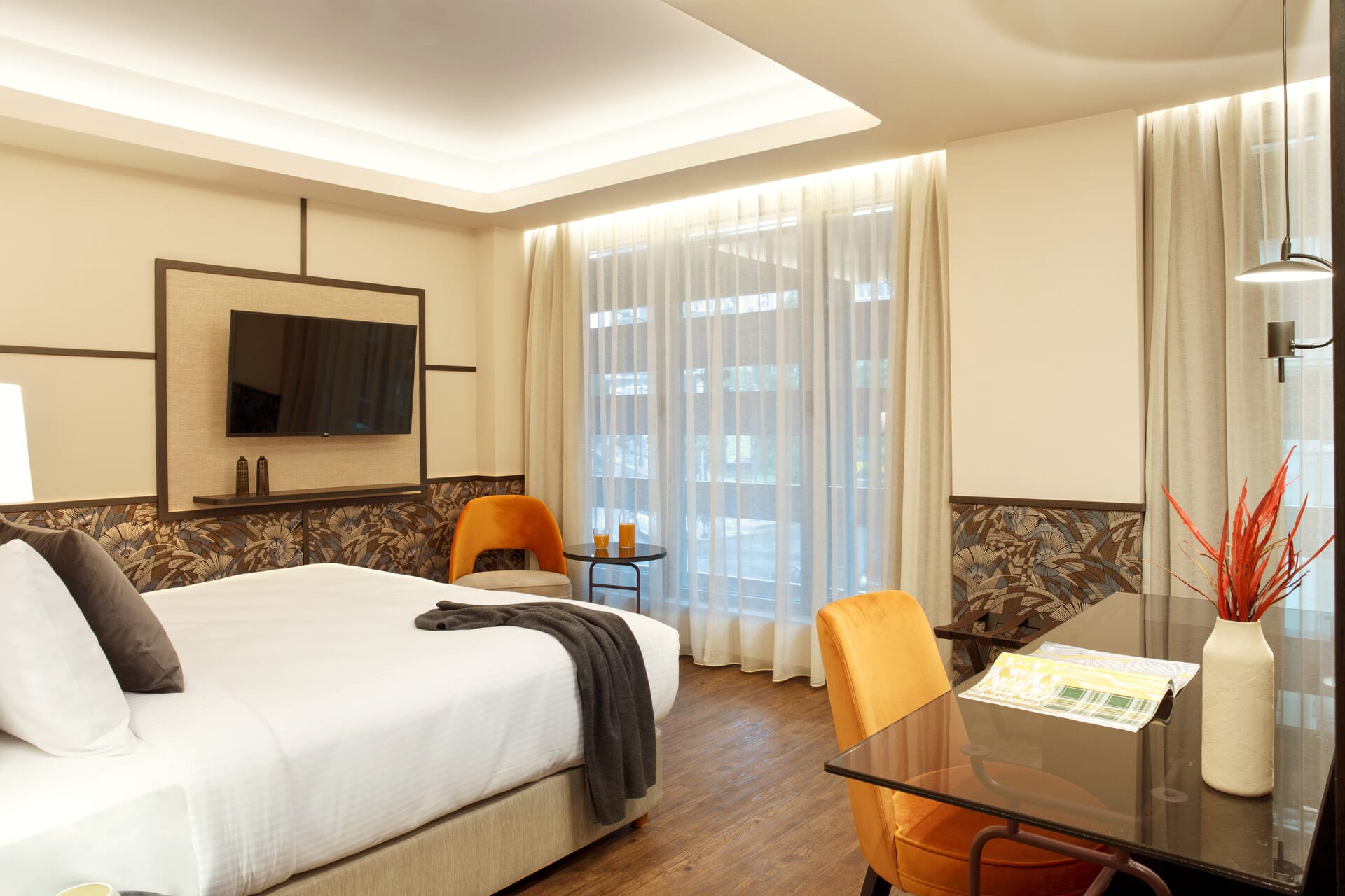 a bedroom with a large window