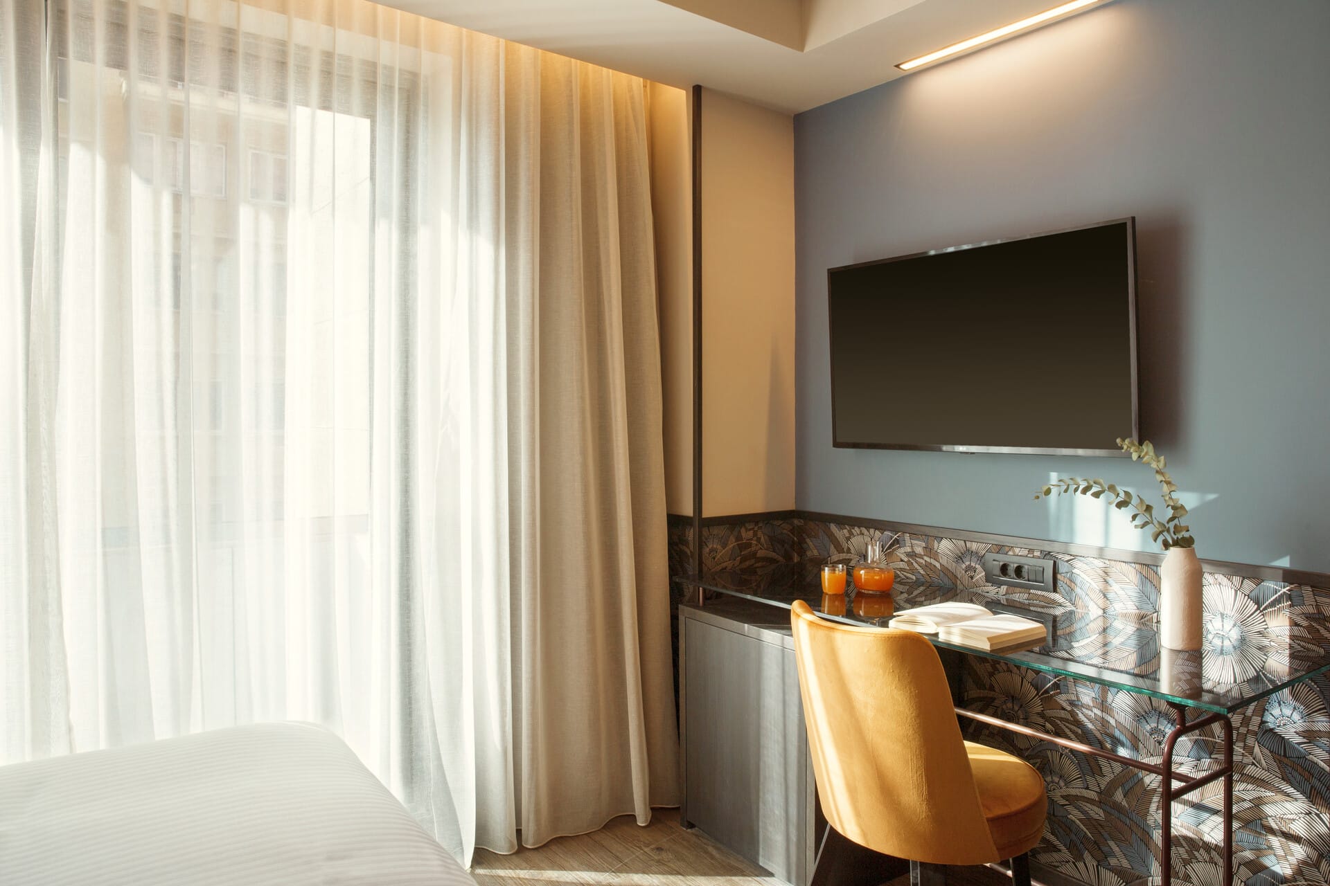 a room with a tv and a table