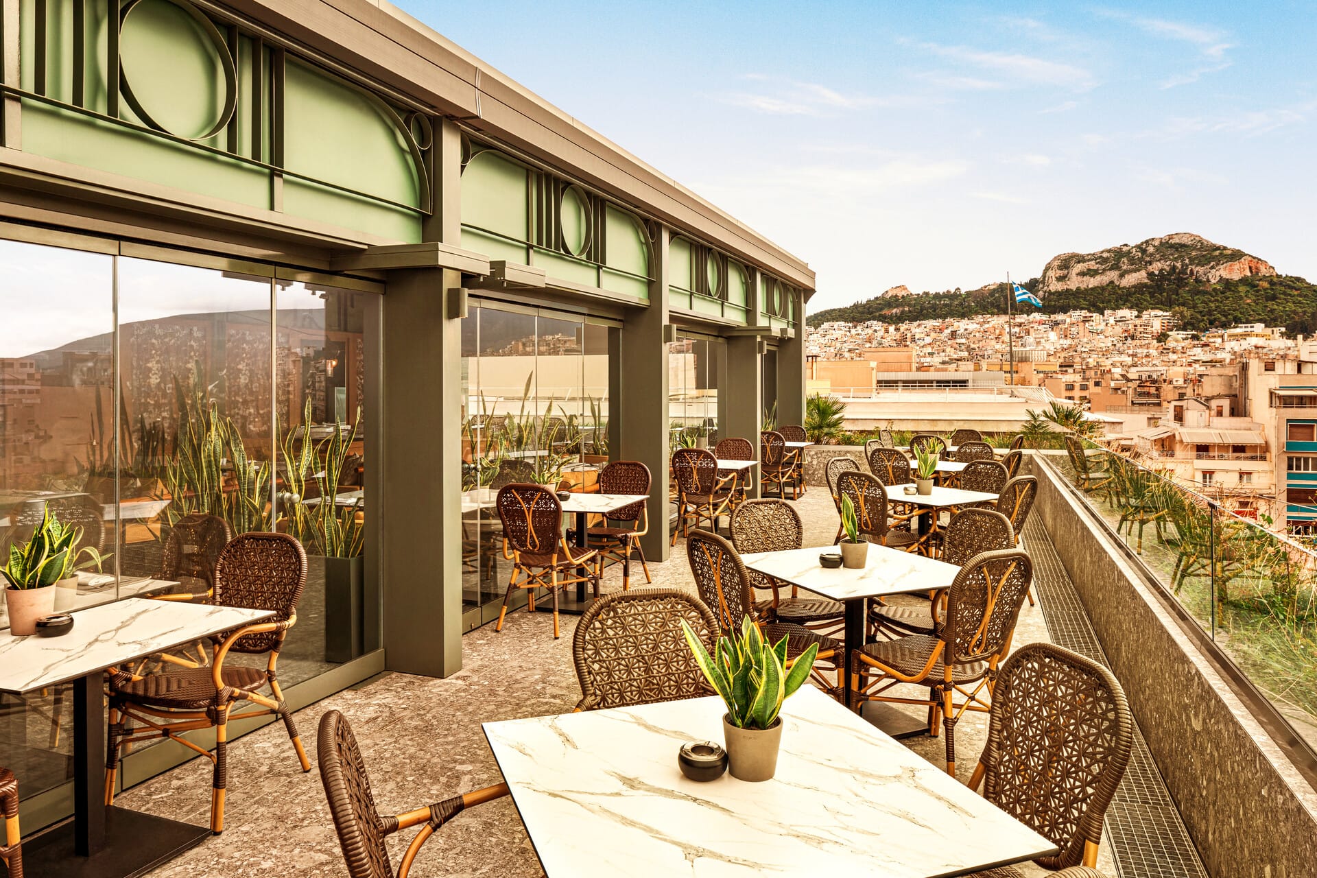 a patio with tables and chairs