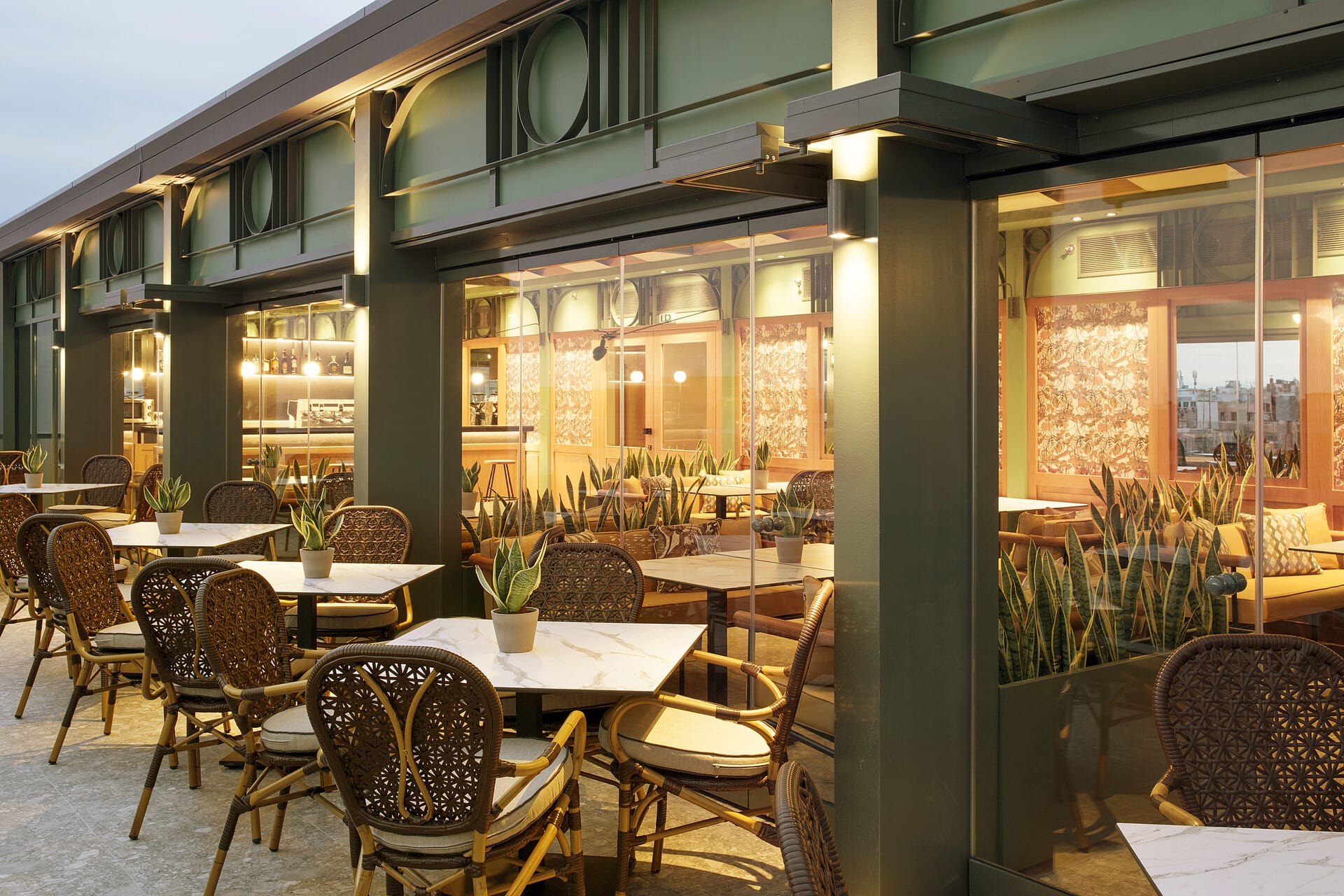 a restaurant with tables and chairs