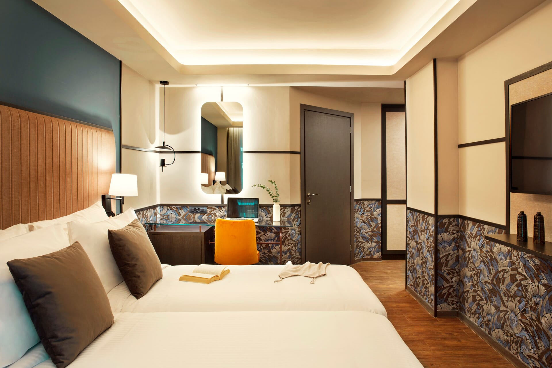 a large bedroom with a large mirror