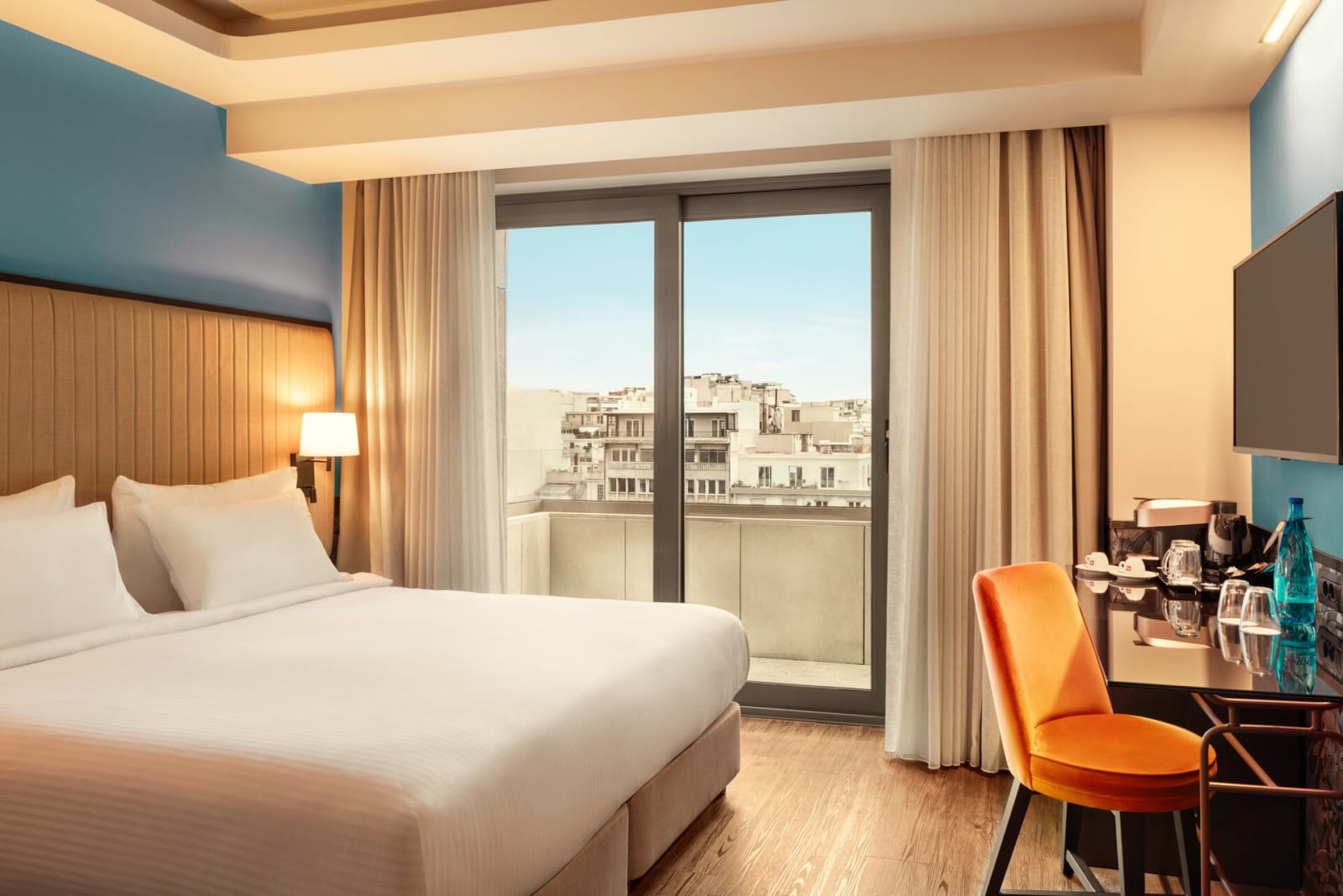a bedroom with a large window