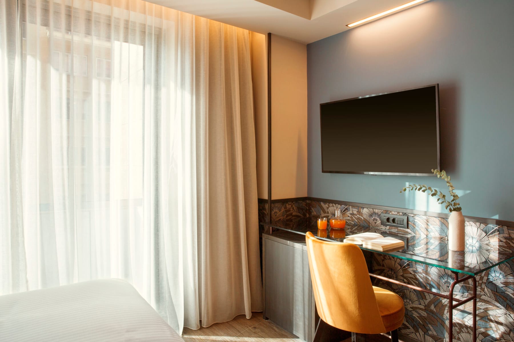 a room with a tv and a table