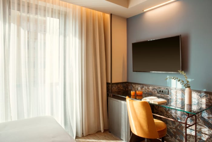 a room with a tv and a table