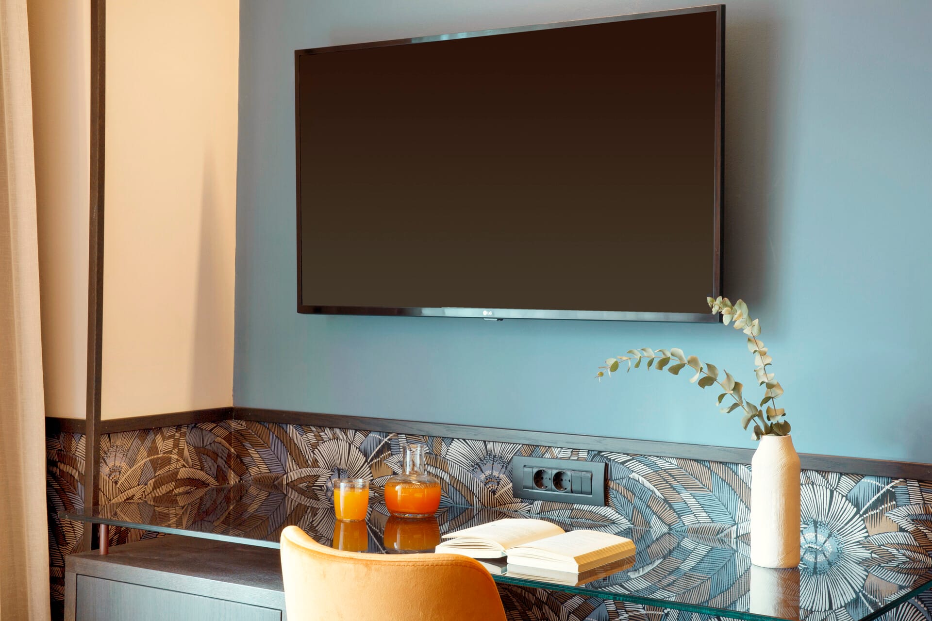 a table with a tv and objects on it