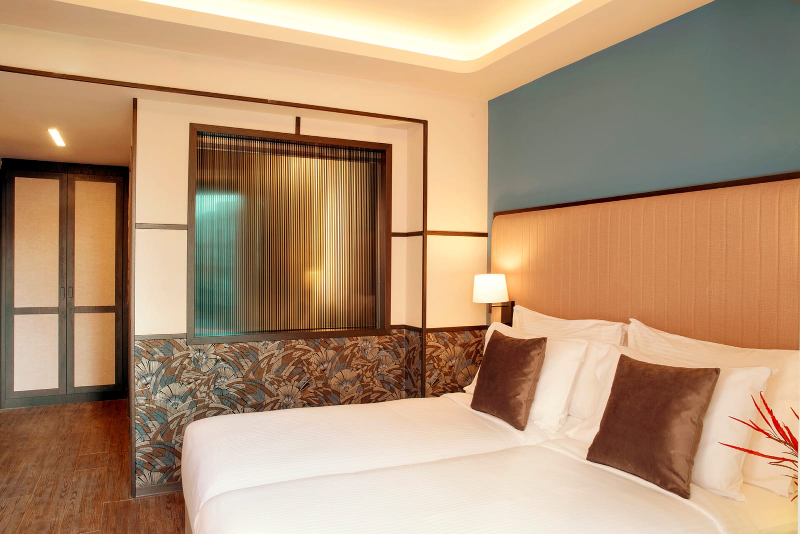 a hotel room with a large mirror