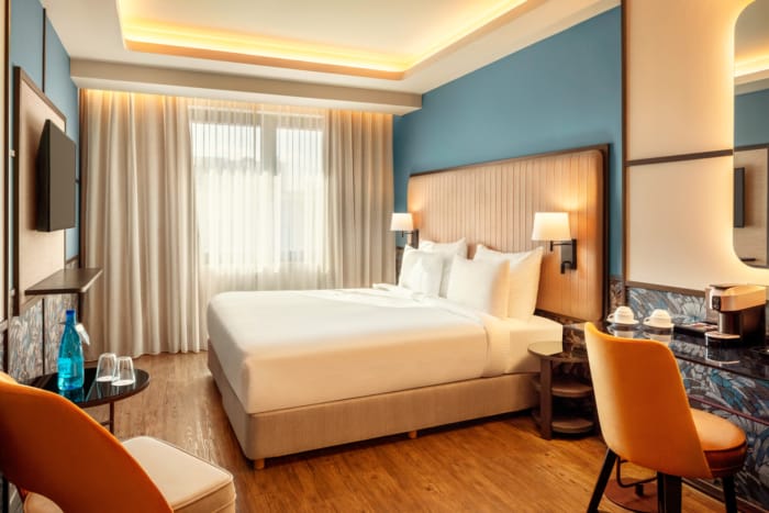 a large bedroom with a large bed