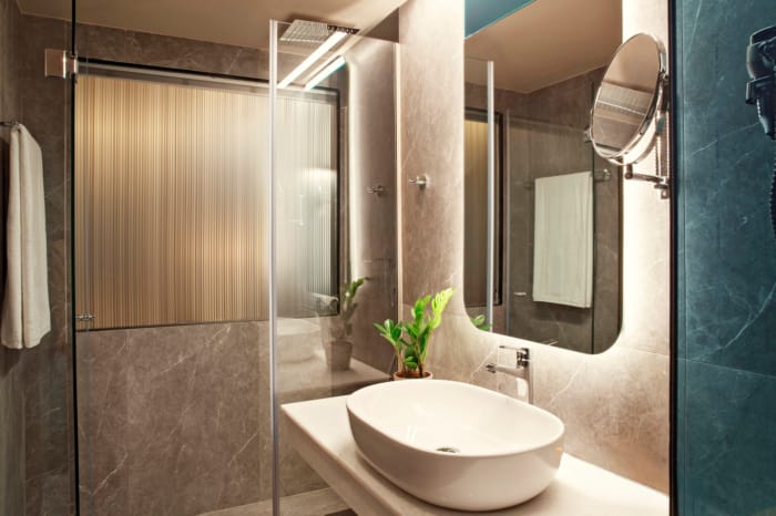 a bathroom with a sink and a mirror